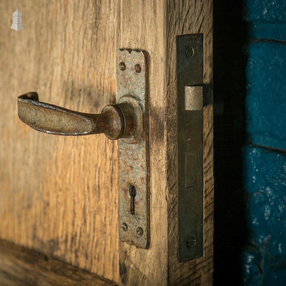 photo furniture Solid Oak Framed Door, Veneered Panels With Visible Deterioration