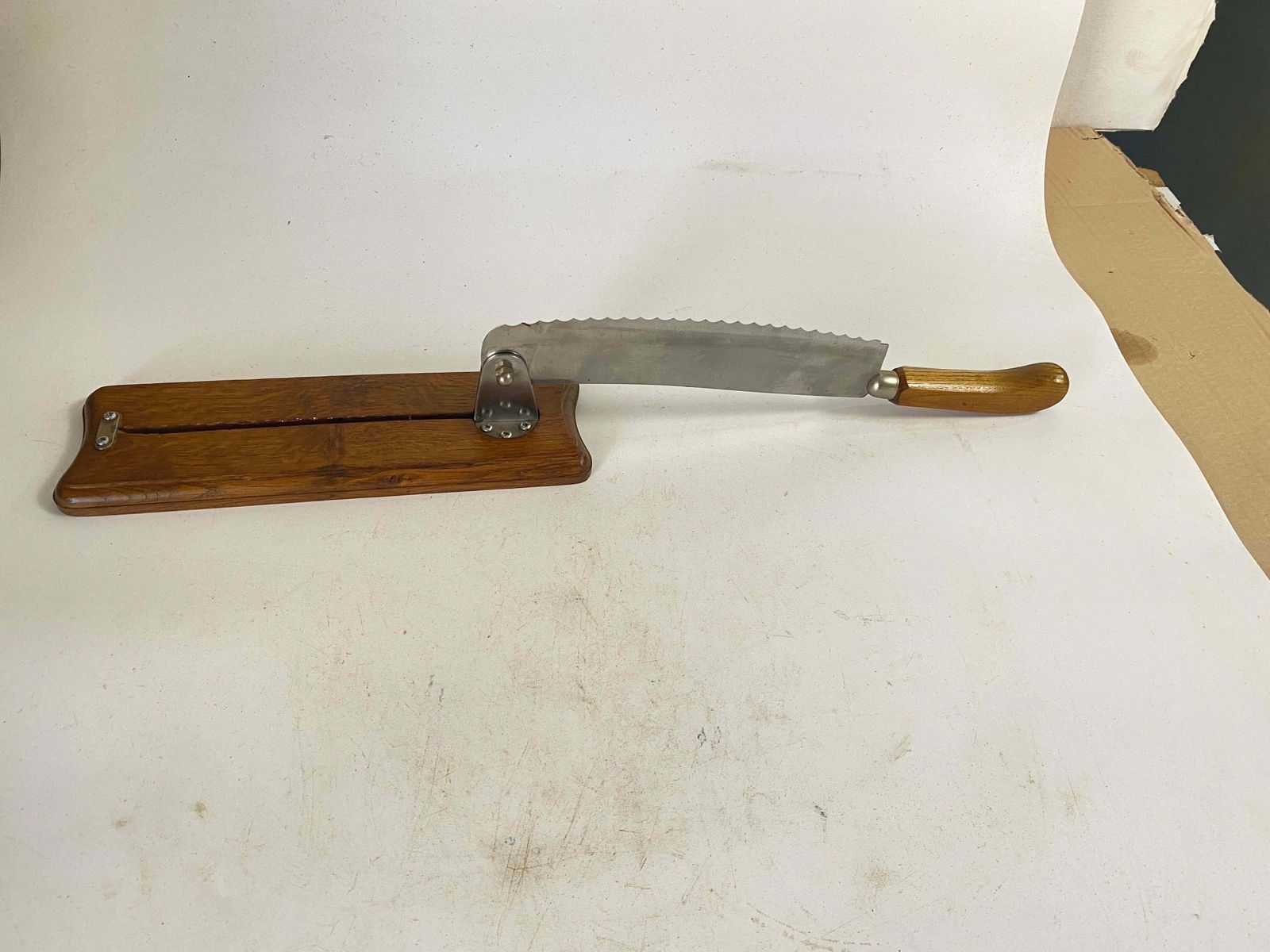 photo furniture French Wood And Steel Bread Knife On A Wood Plate Brown Color 20th Century
