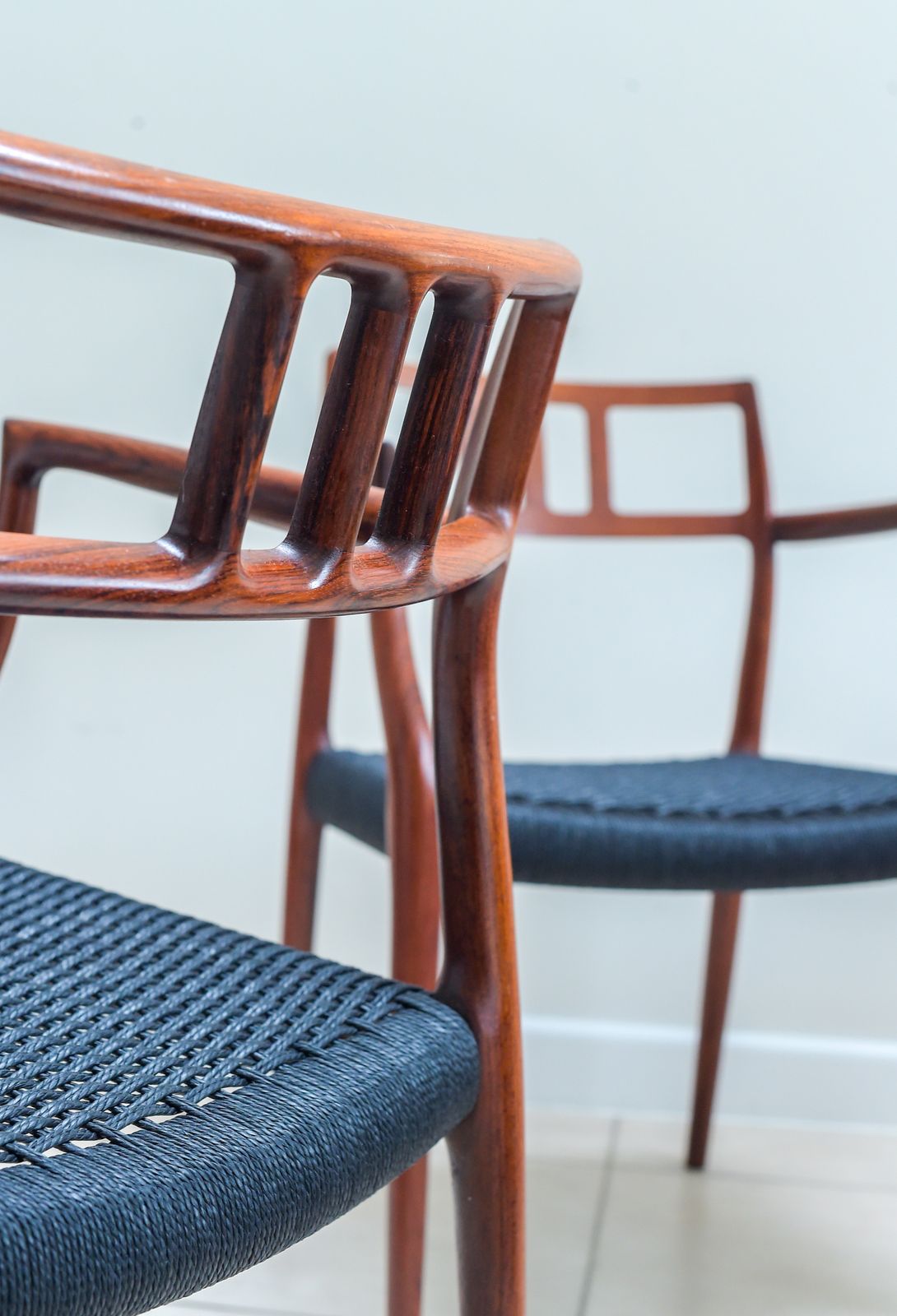 Furniture A Scarce Pair Of Niels Møller Model 64 Rosewood Carver Chairs For J L Moller, Denmark. photo