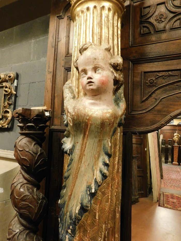 photo buy Pair Of Wooden Columns, Carved And Gilded With Polychrome Putti, From Spain.