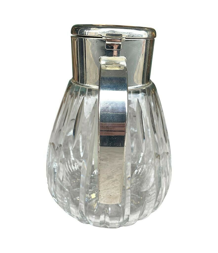 A 1960s German Crystal And Silver Plated Lemonade Jug With Central Ice Tube photo furniture