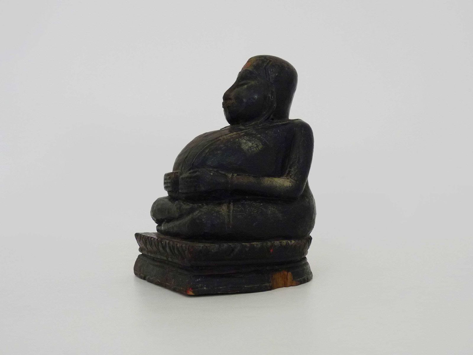 Khmer Laughing Buddha Statue In Carved Wood photo for sale