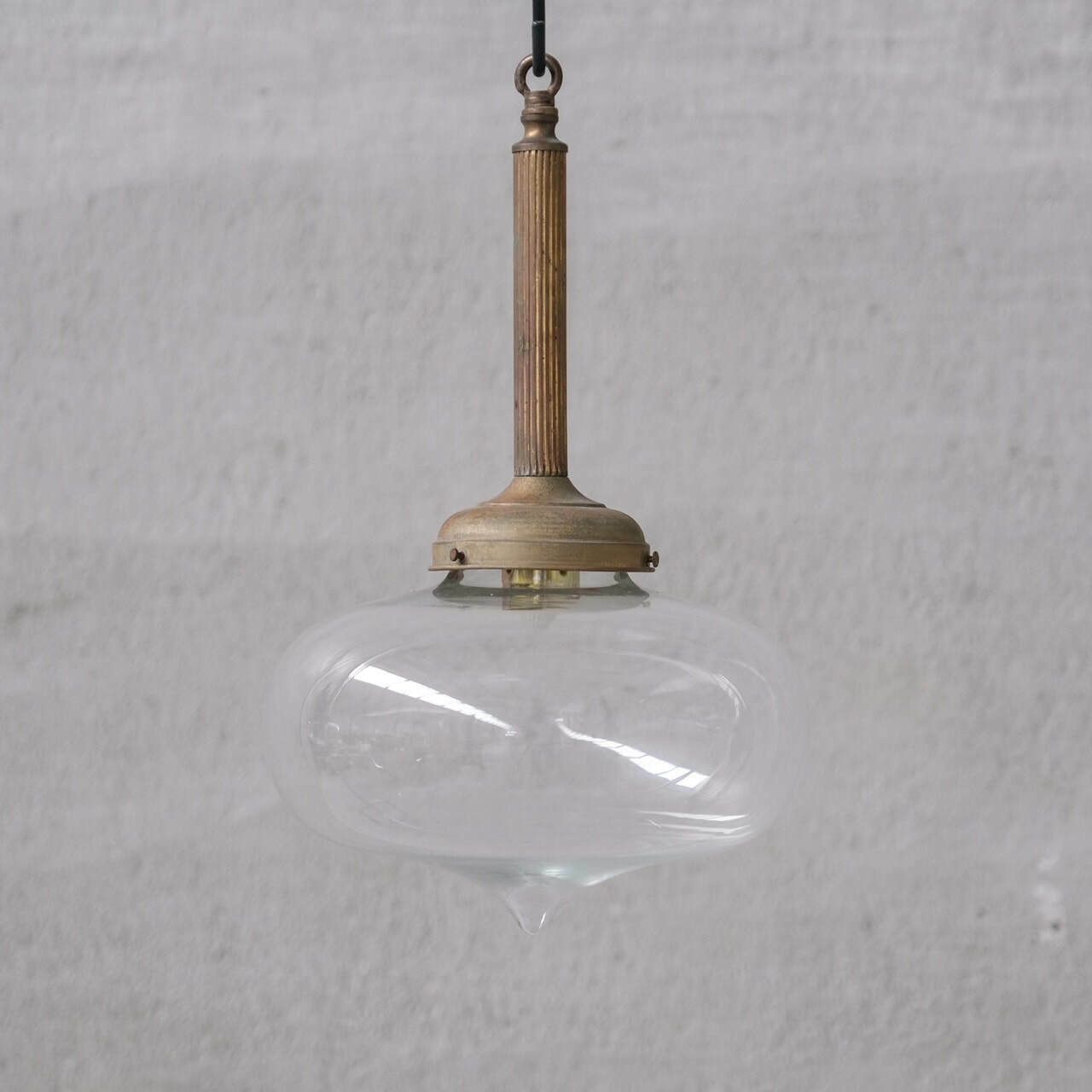 Pair Of Clear Glass And Brass Mid Century Teardrop Pendant Lights photo for sale
