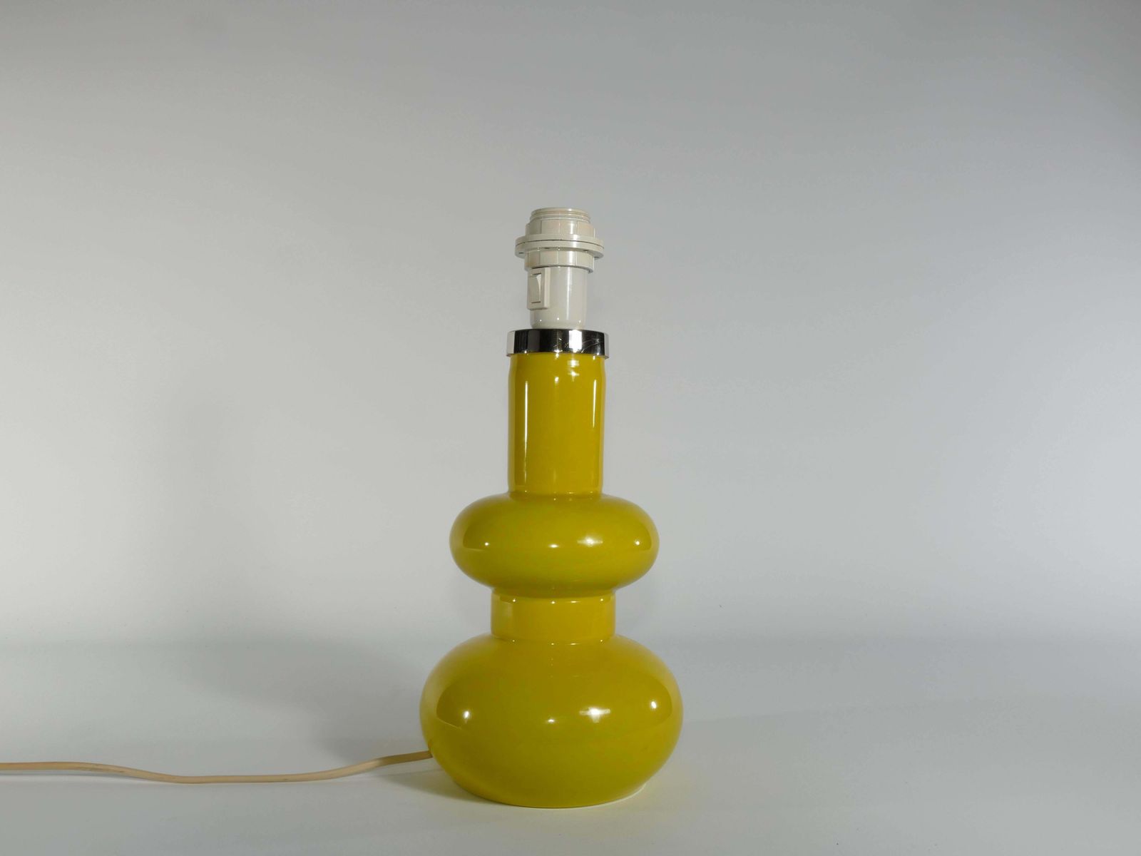 Lighting Mid Century Modern Curvaceous Bright Yellow Glass Table Lamp By Orrefors, 1960s photo