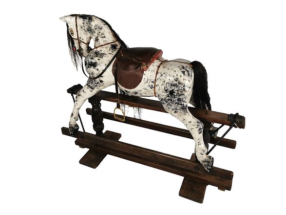 A Victorian Pillar Stand Rocking Horse photo furniture
