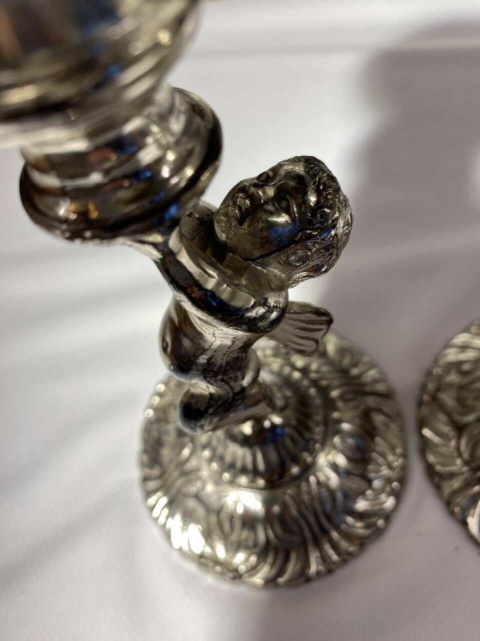 Two Silver Metal Candlesticks Decorated With 20th Century Cherubs photo buy