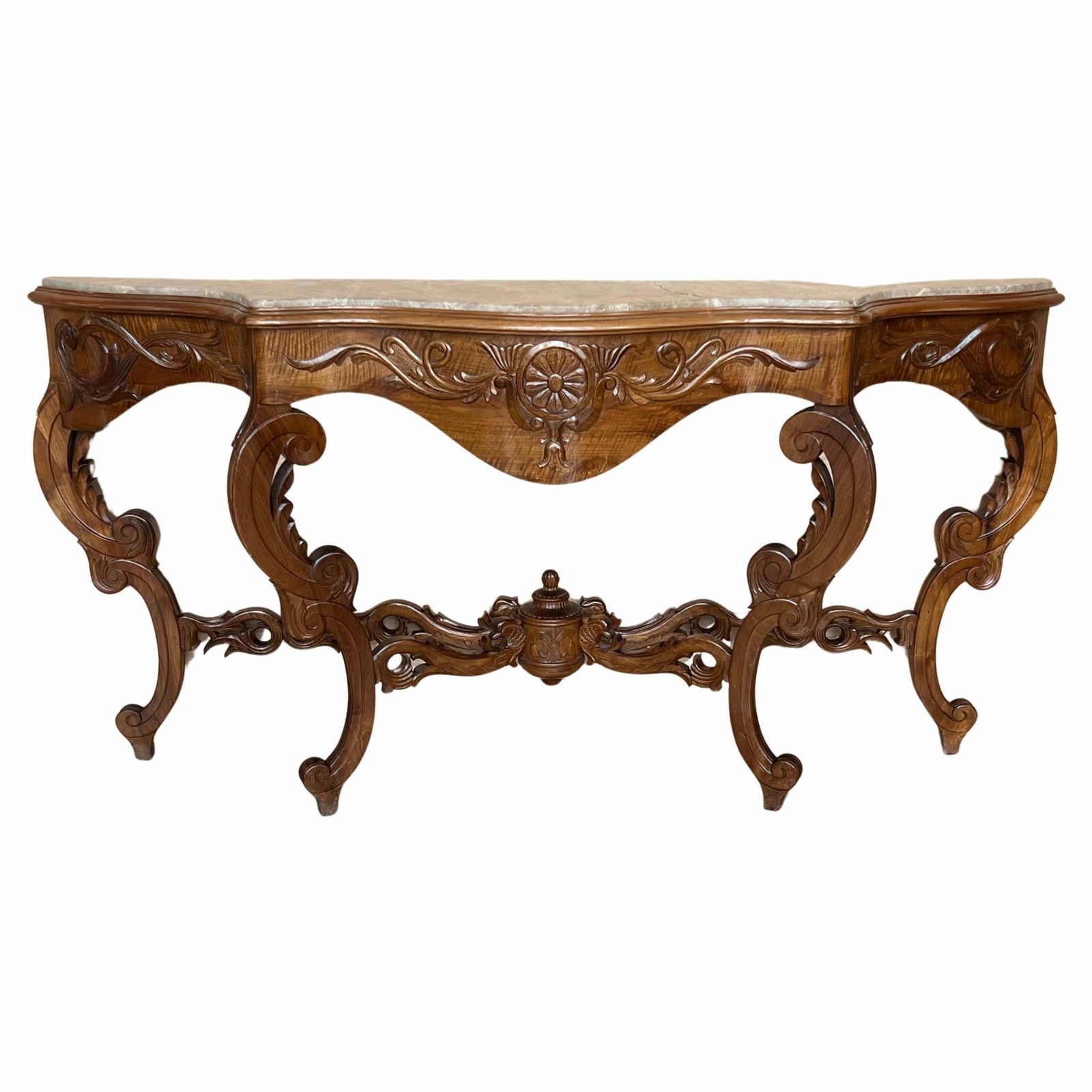Grande console de style Régence française en noyer sculpté aux bords dorés