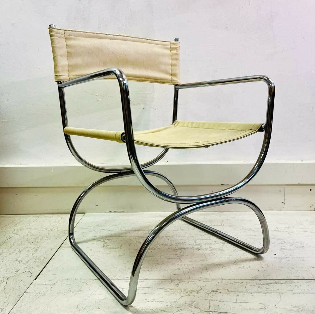 A Pair Of Mid Century Cream Leather And Chrome Chairs Dining Chairs photo for sale