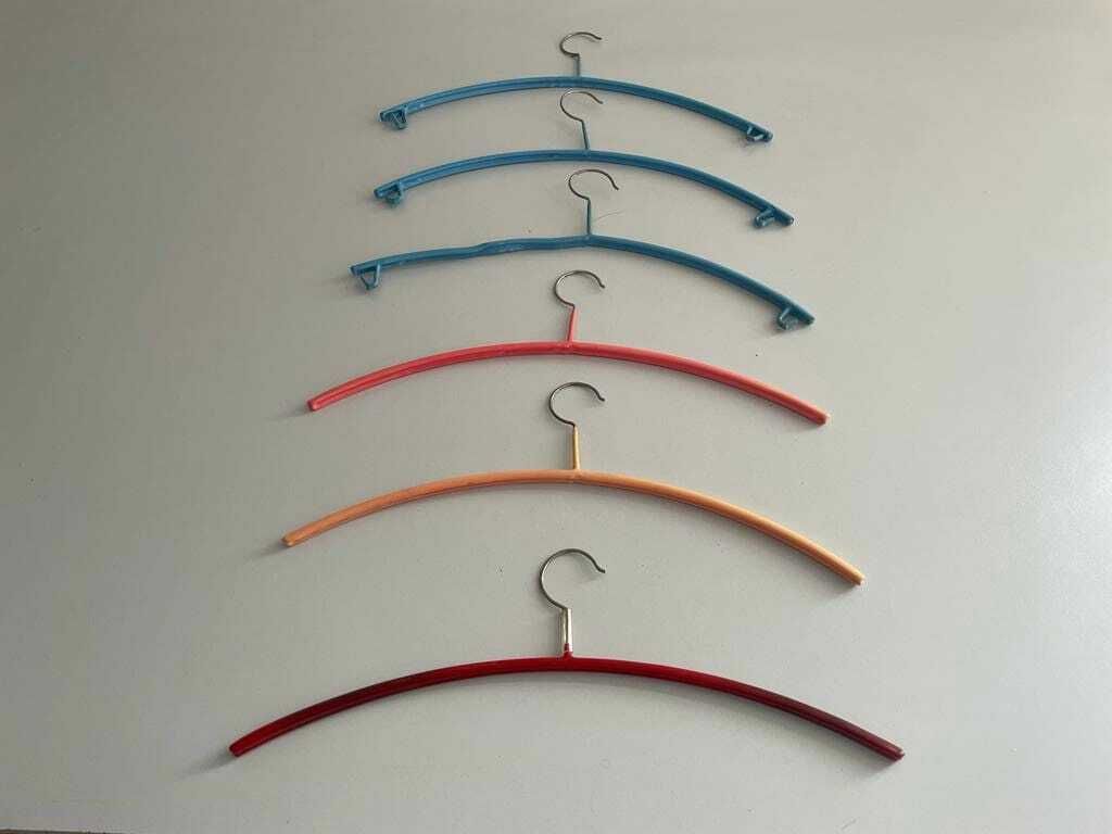 Set Of 6 Blue/Yellow/Pink/Red Metal Italian Clothes Hangers photo for sale