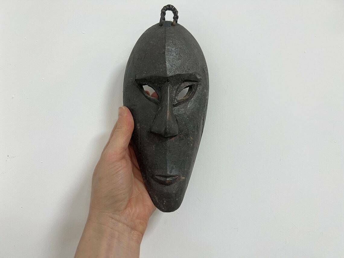 Vintage Black Wooden African Mask Wall Hanging, Hand Carved Primitive Mask Wood Decoration photo for sale