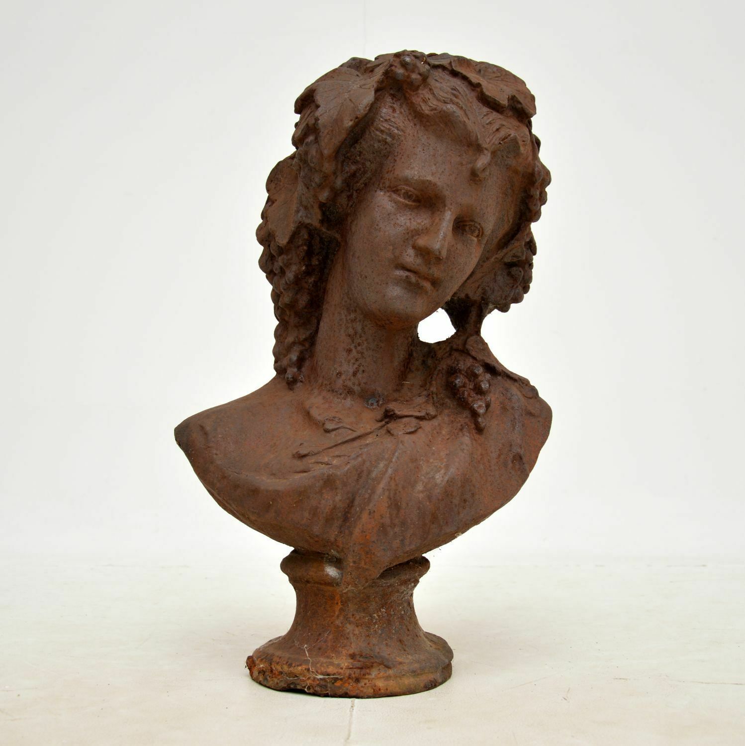Antique Cast Iron Bust Of A Young Woman