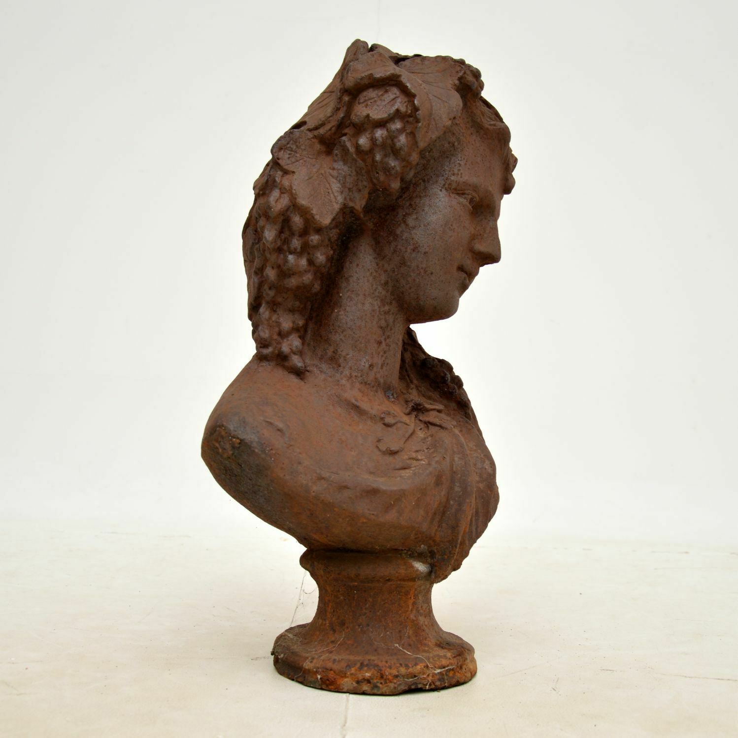 Antique Cast Iron Bust Of A Young Woman photo for sale