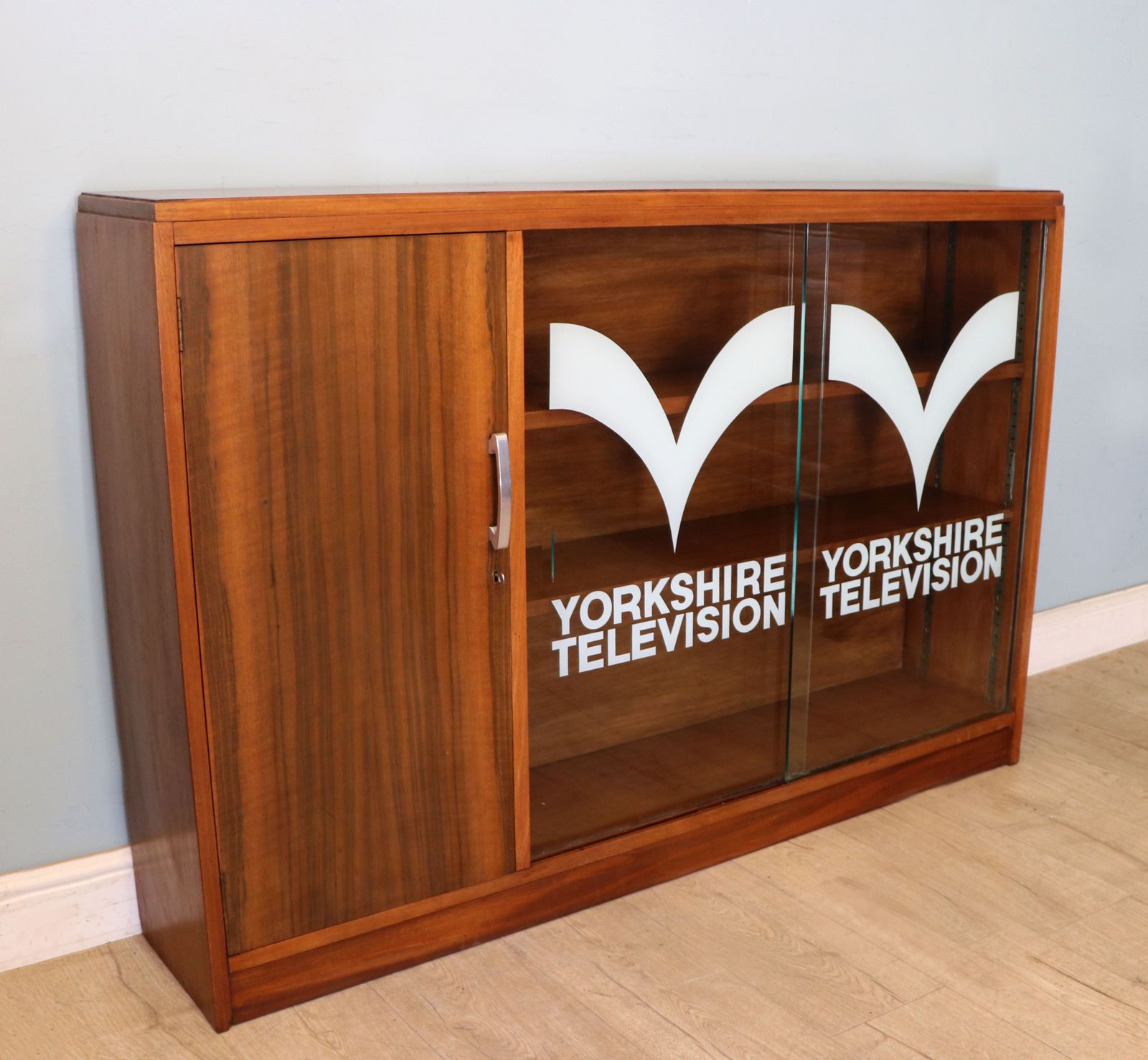 A  Mid Century Retro Style Display Cabinet By Cresta, Sign Written Yorkshire Television. photo furniture