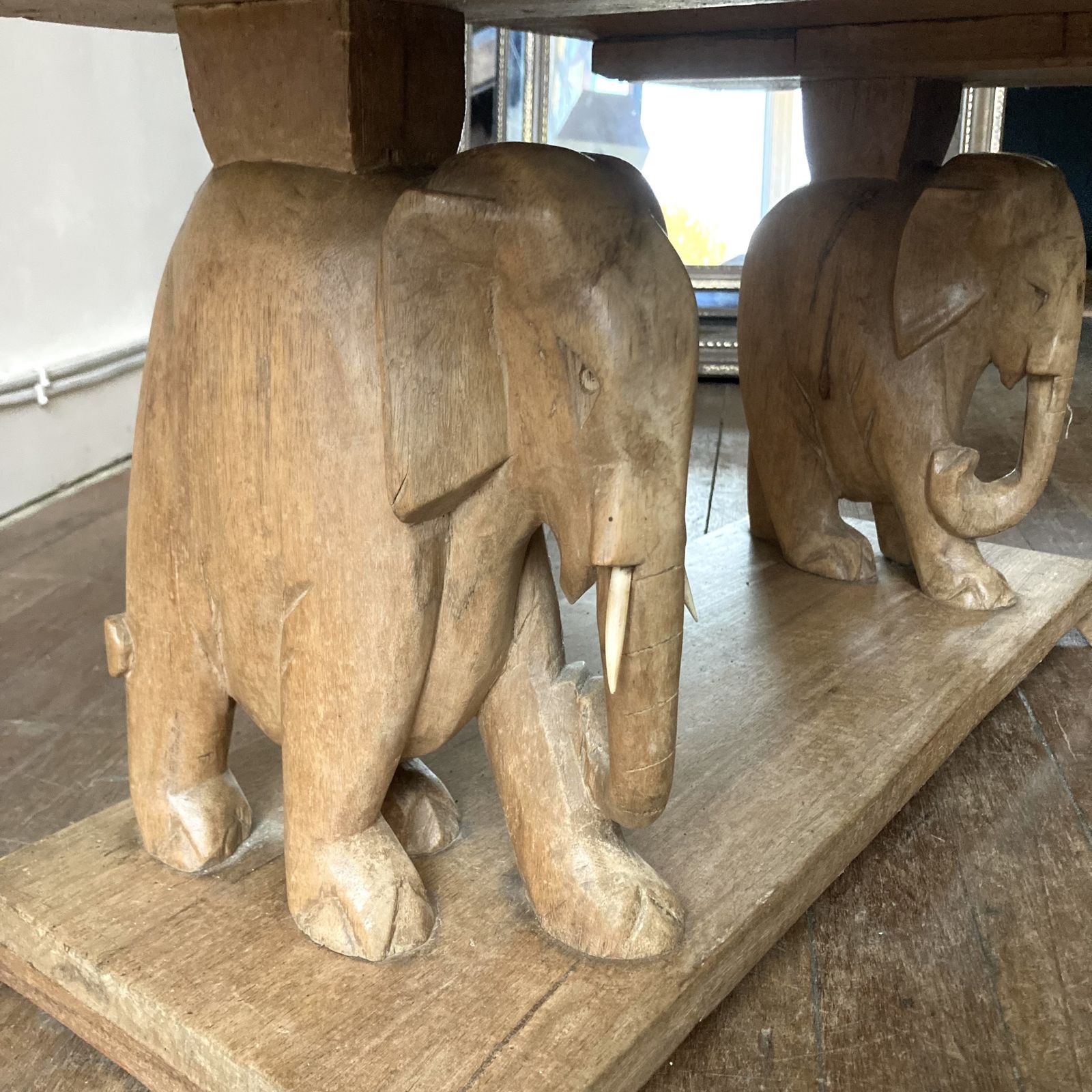 An Exotic Hardwood Low Table With Two Elephant Supports, One Minus A Tusk. 1950s photo furniture