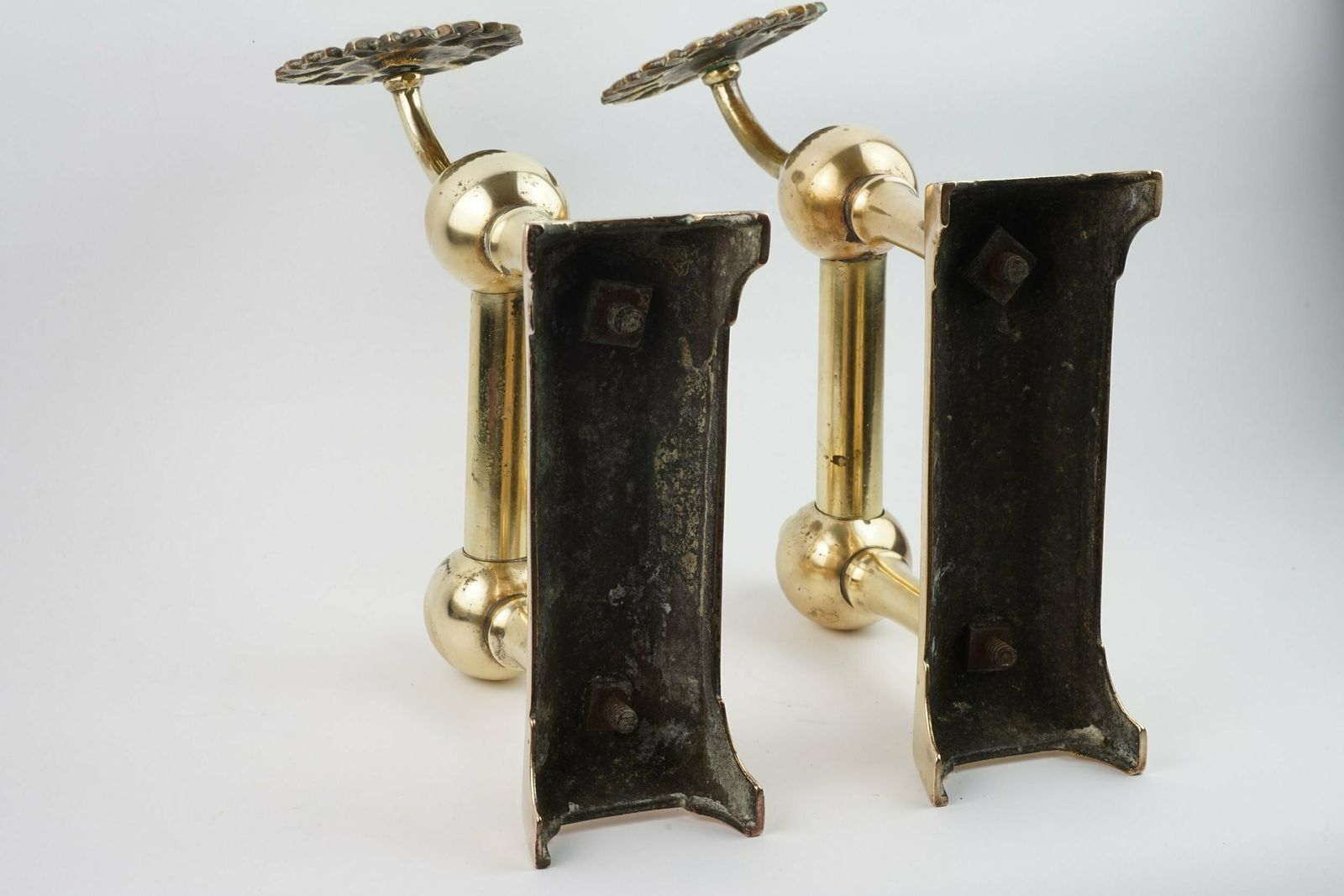 A Pair Of Aesthetic Movement Sunflower Brass Fire Dogs, Circa 1875 photo 495.0