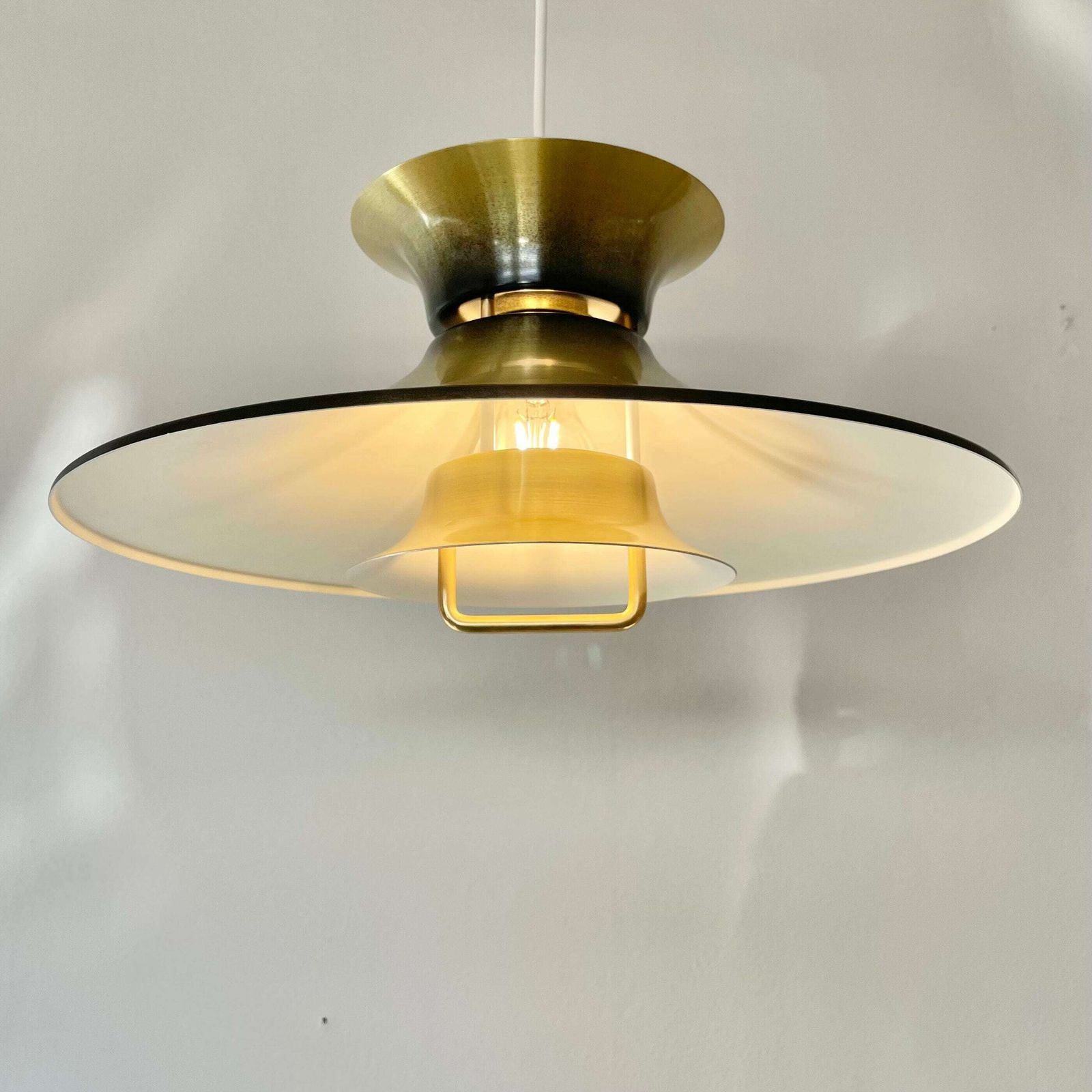 Danish Mid Century Modern Design Minimalist Ceiling Lamp With Gold And Black Painted Multilayer Metal Shades, Trumpet Top And Hanger photo for sale
