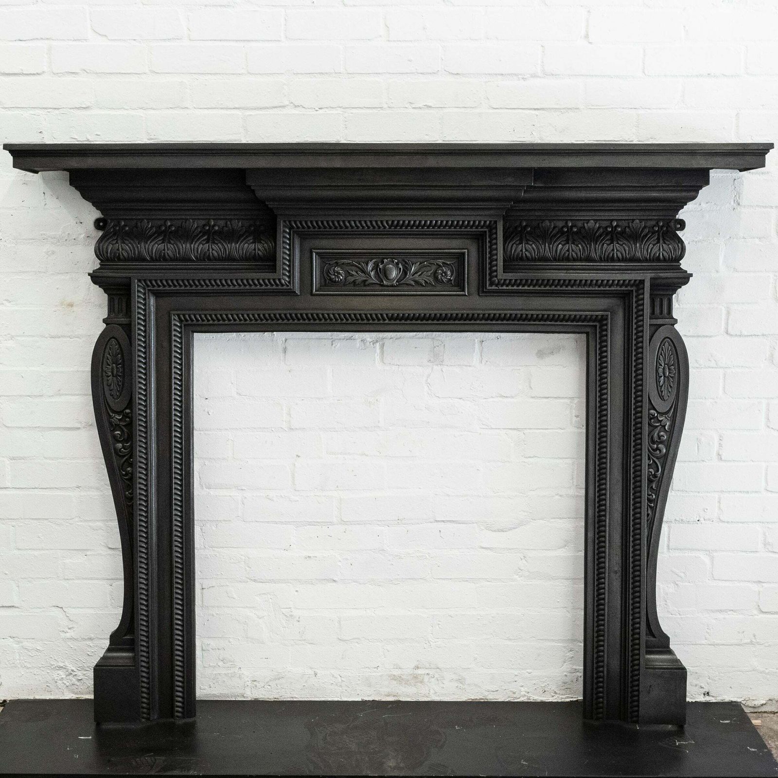 Home Fixtures Antique Cast Iron Fireplace Surround photo