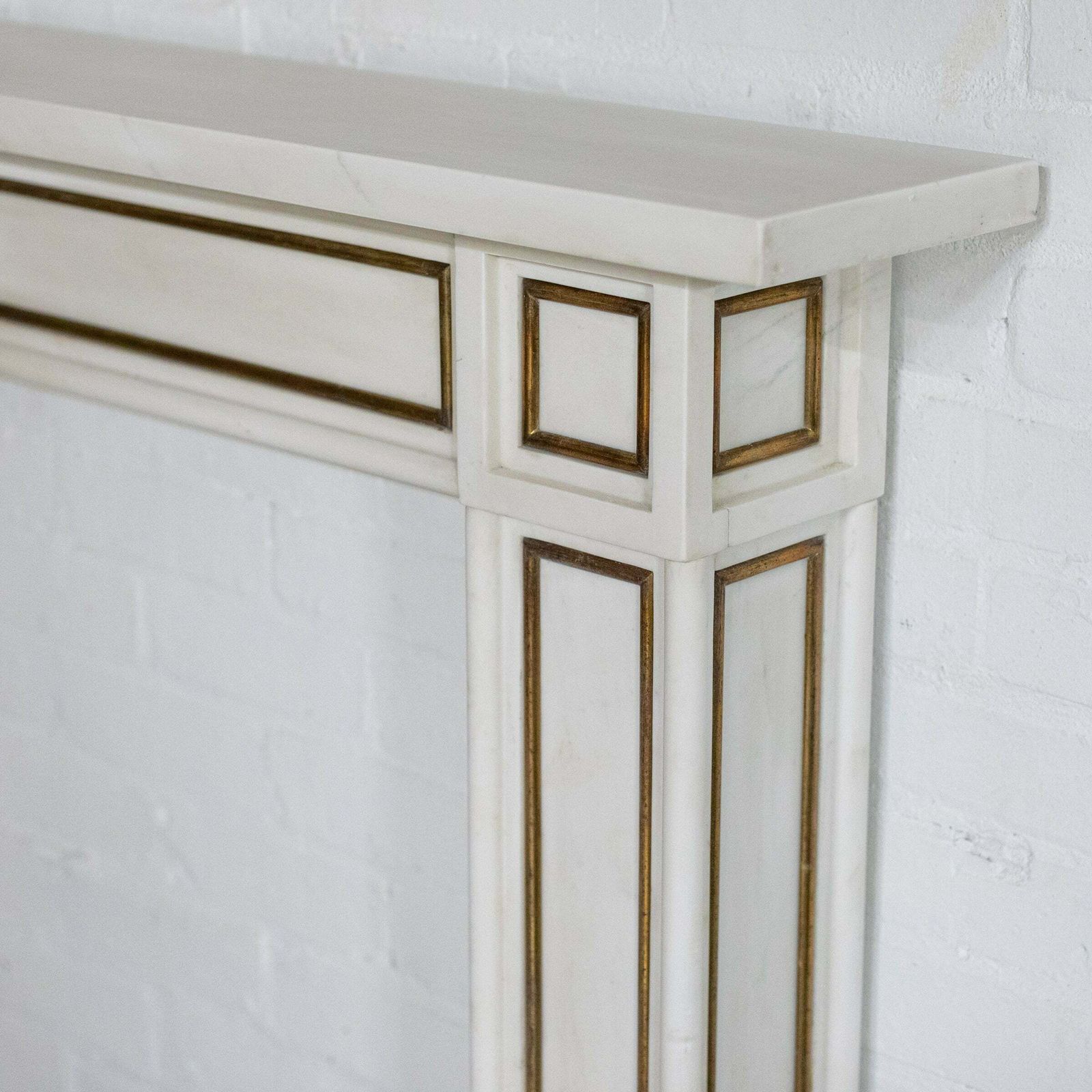 photo furniture Reclaimed Statuary Marble Fireplace Surround With Brass Detail