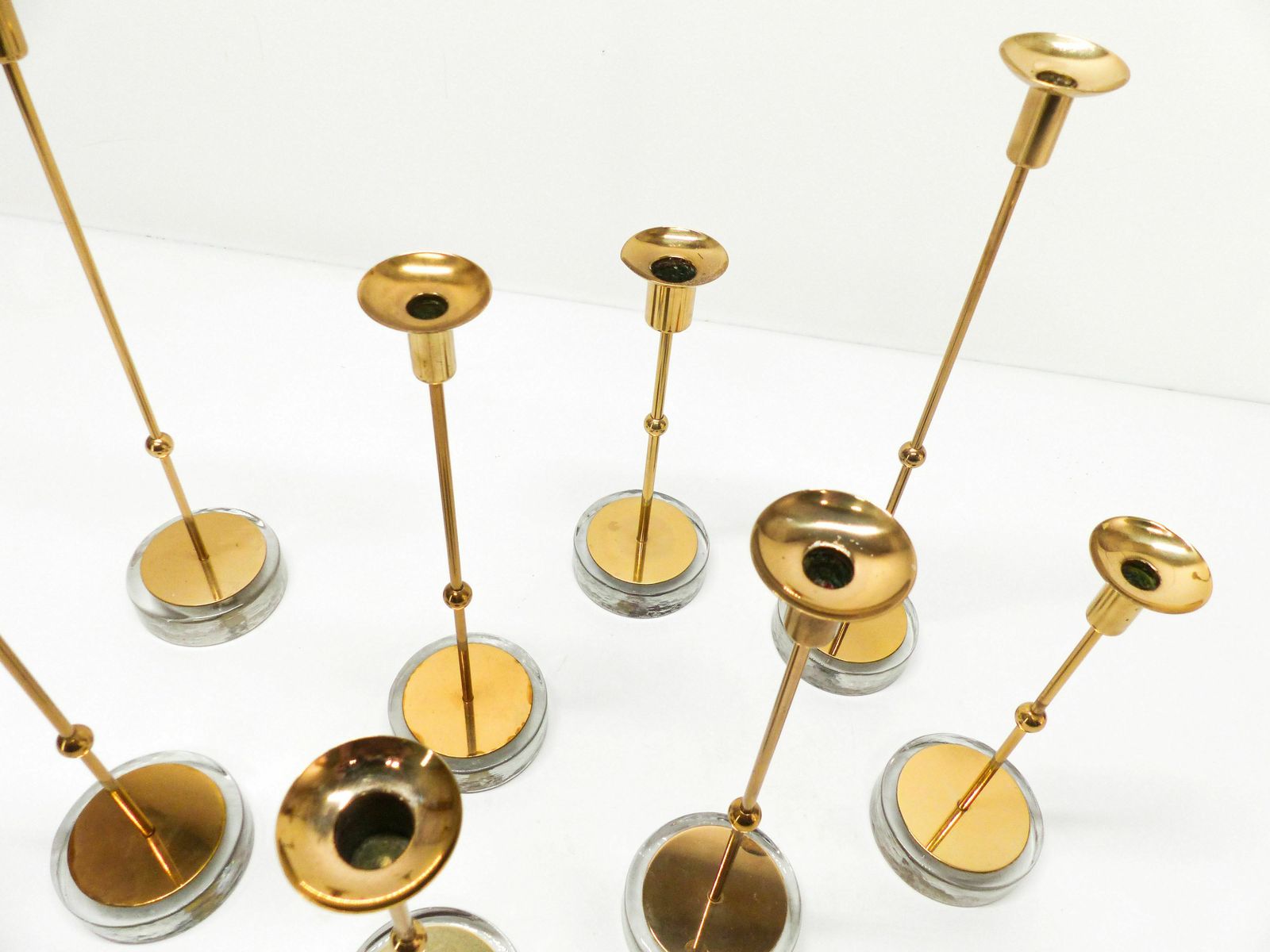 Set Of 8 Scandinavian Candlesticks Gunnar Ander For Ystad Metall 1960 photo for sale