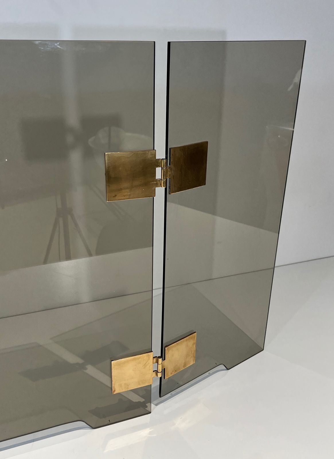 Tri Fold Firewall In Smoked Glass And Brass. Around 1970 photo vintage