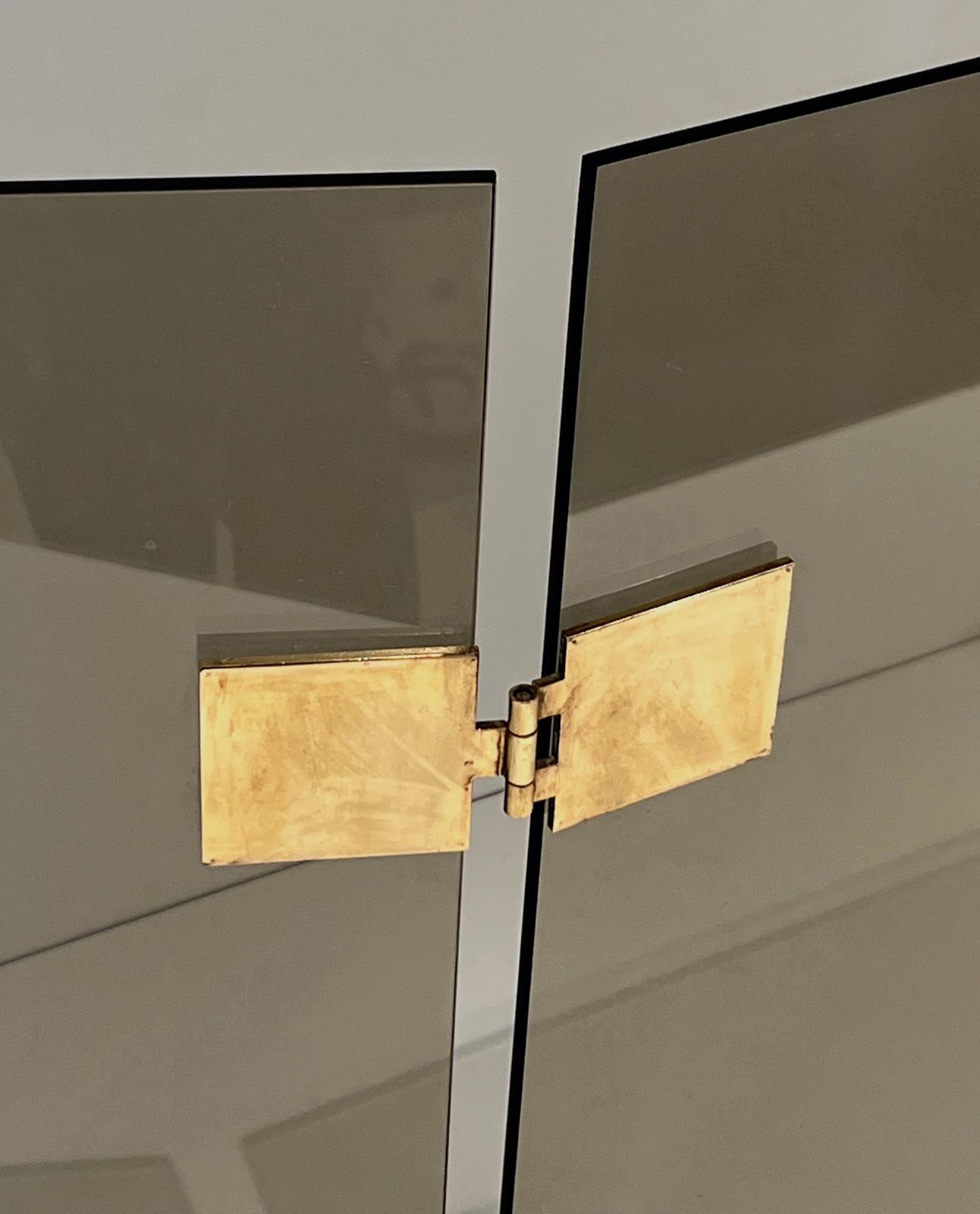photo for sale Tri Fold Firewall In Smoked Glass And Brass. Around 1970