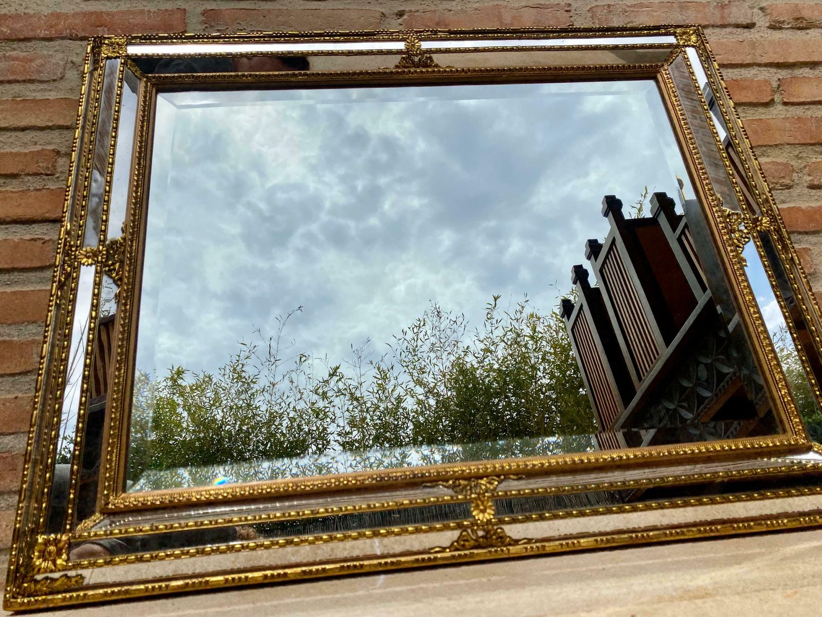 Miroir mural Directoire en bois sculpté doré, années 1940 photo for sale