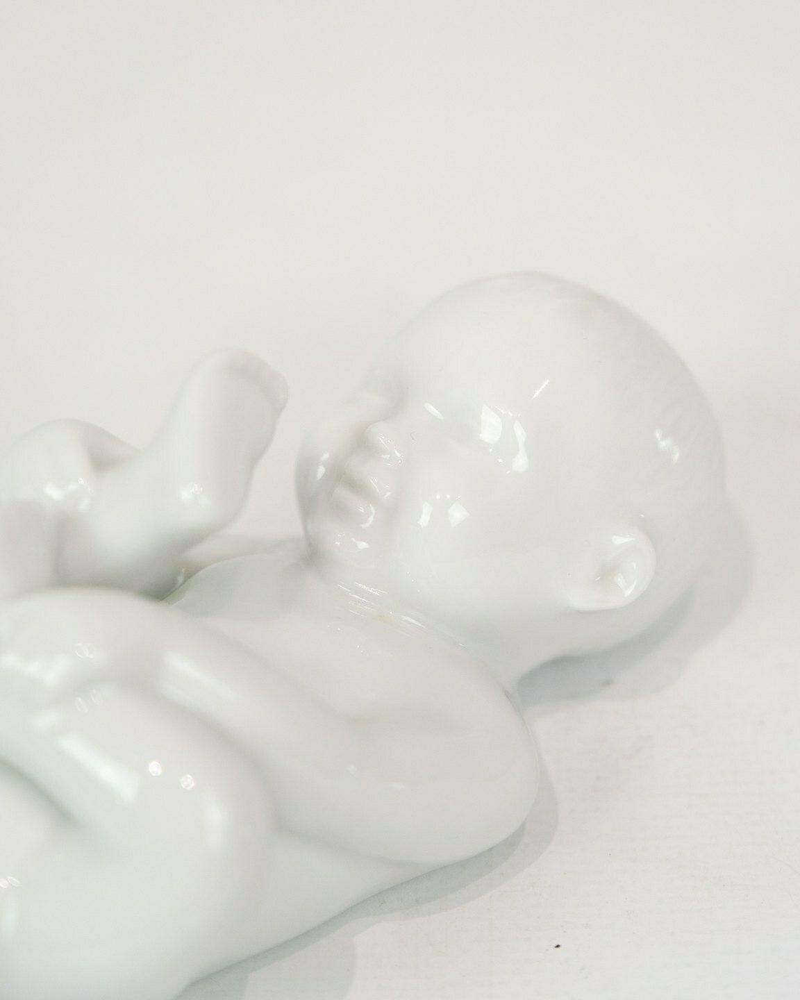 Porcelain Figure Babbling Baby In White Glaze By Allan Therkelsen photo furniture