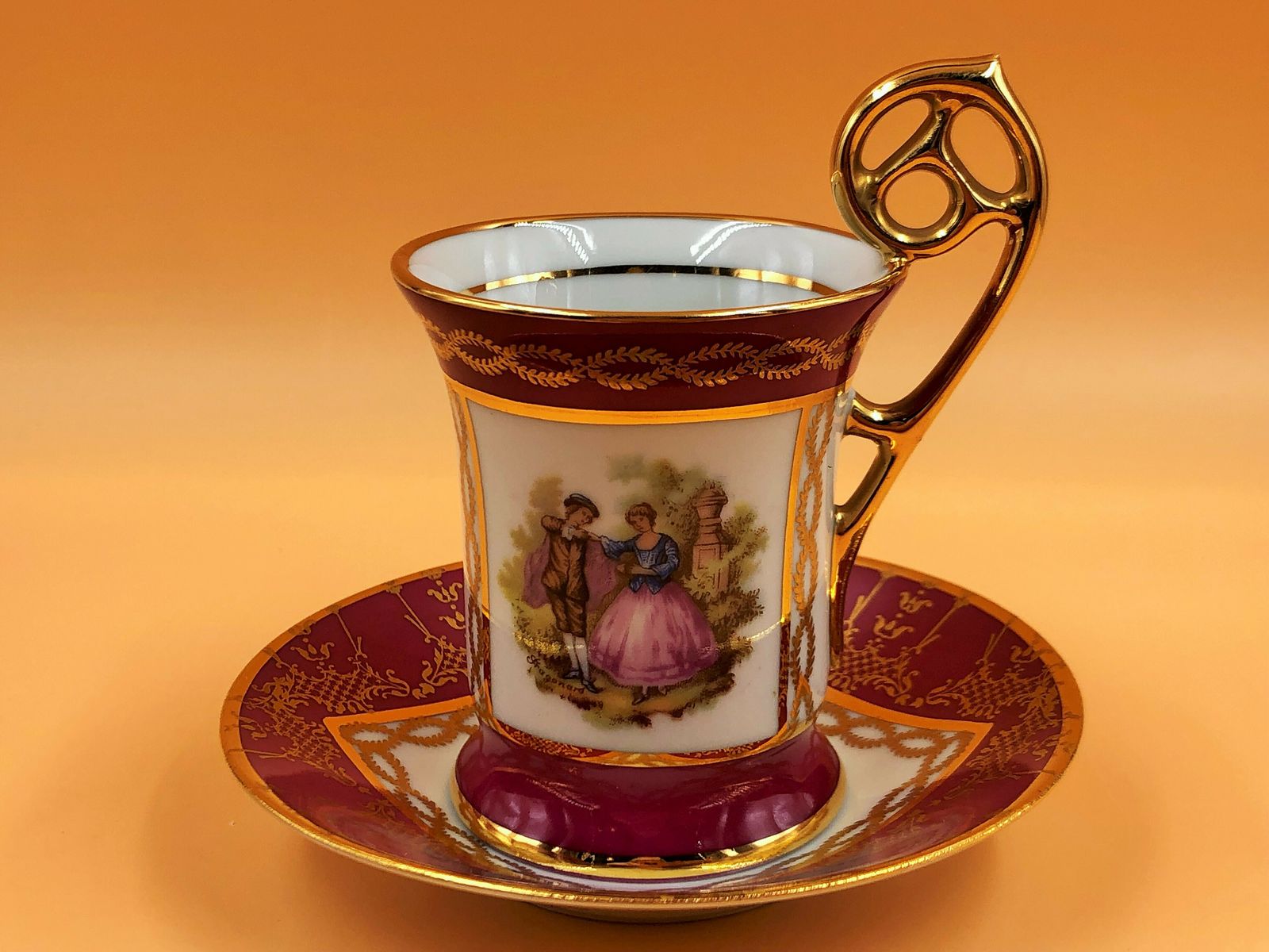 photo furniture Limoges Meissner Porcelain Pink Fragonard Courting Couple Demitasse / Chocolate Cup And Saucer Duo.