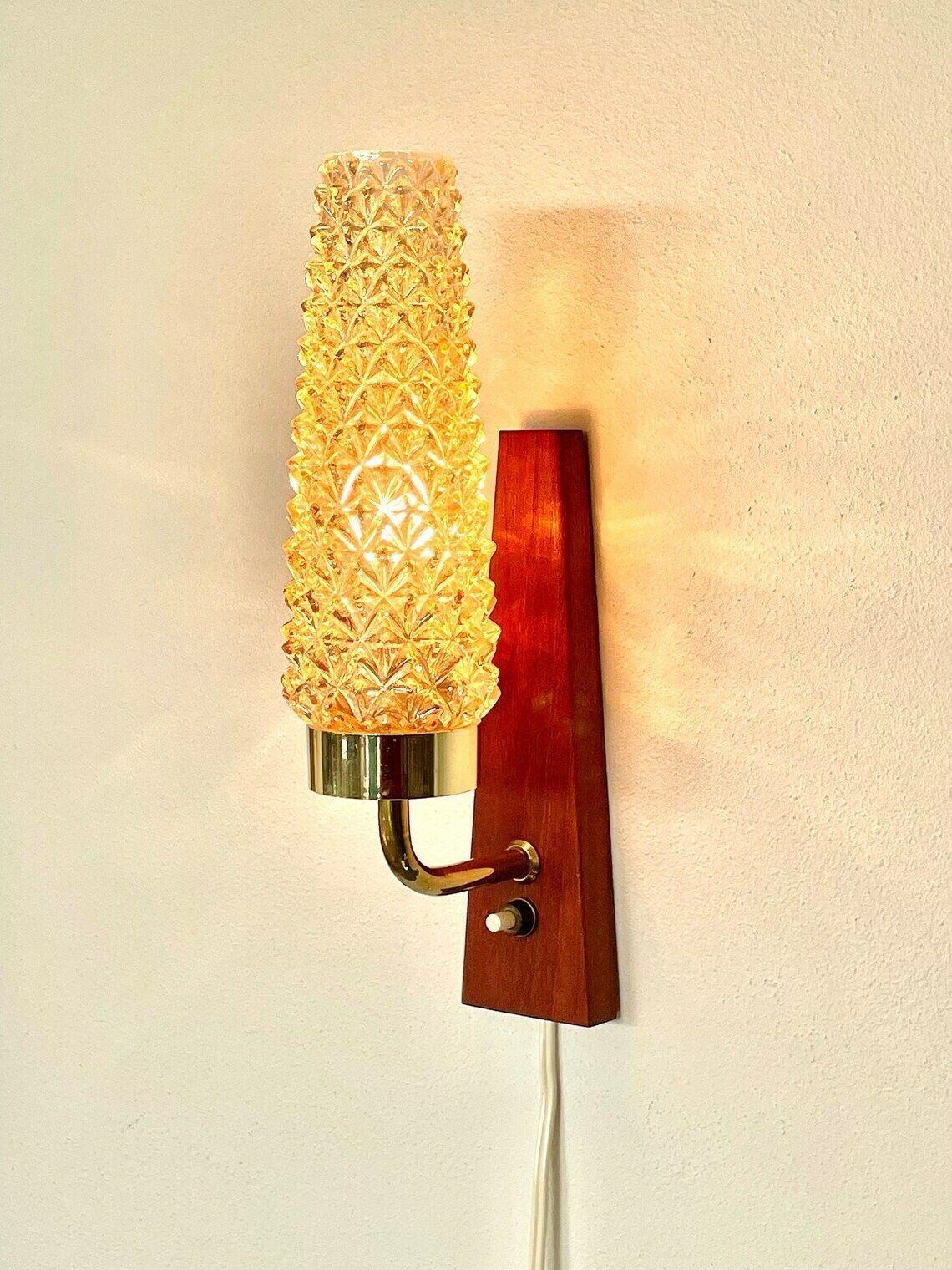 Single Danish Mid Century Teak Wooden Wall Lamp With Heavy Amber Glass Shade In Spike Pattern photo for sale