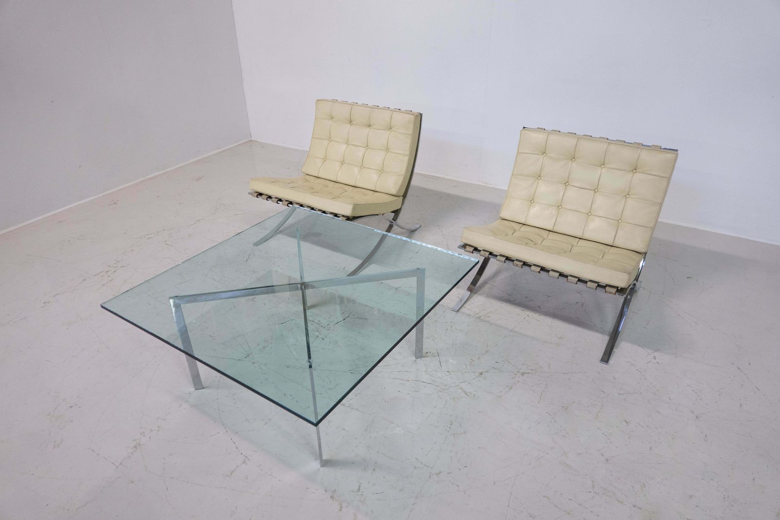 Pair Of Off White Leather Barcelona Chairs By Mies Van Der Rohe For Knoll photo vintage