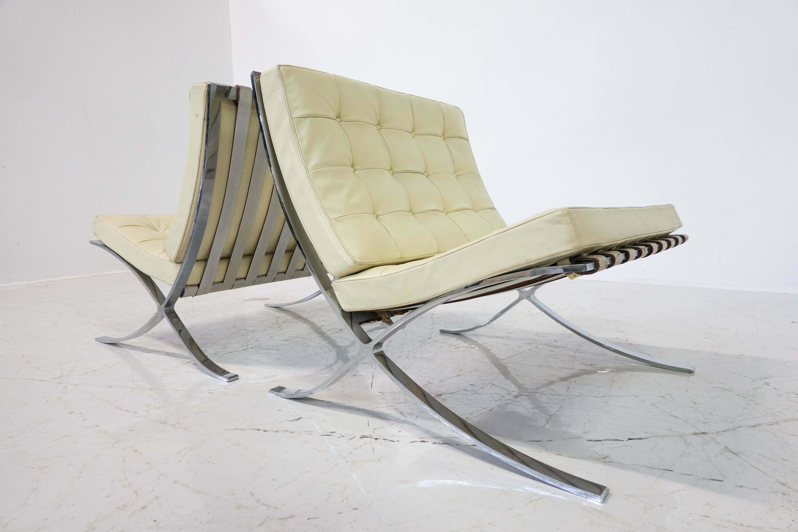 photo for sale Pair Of Off White Leather Barcelona Chairs By Mies Van Der Rohe For Knoll