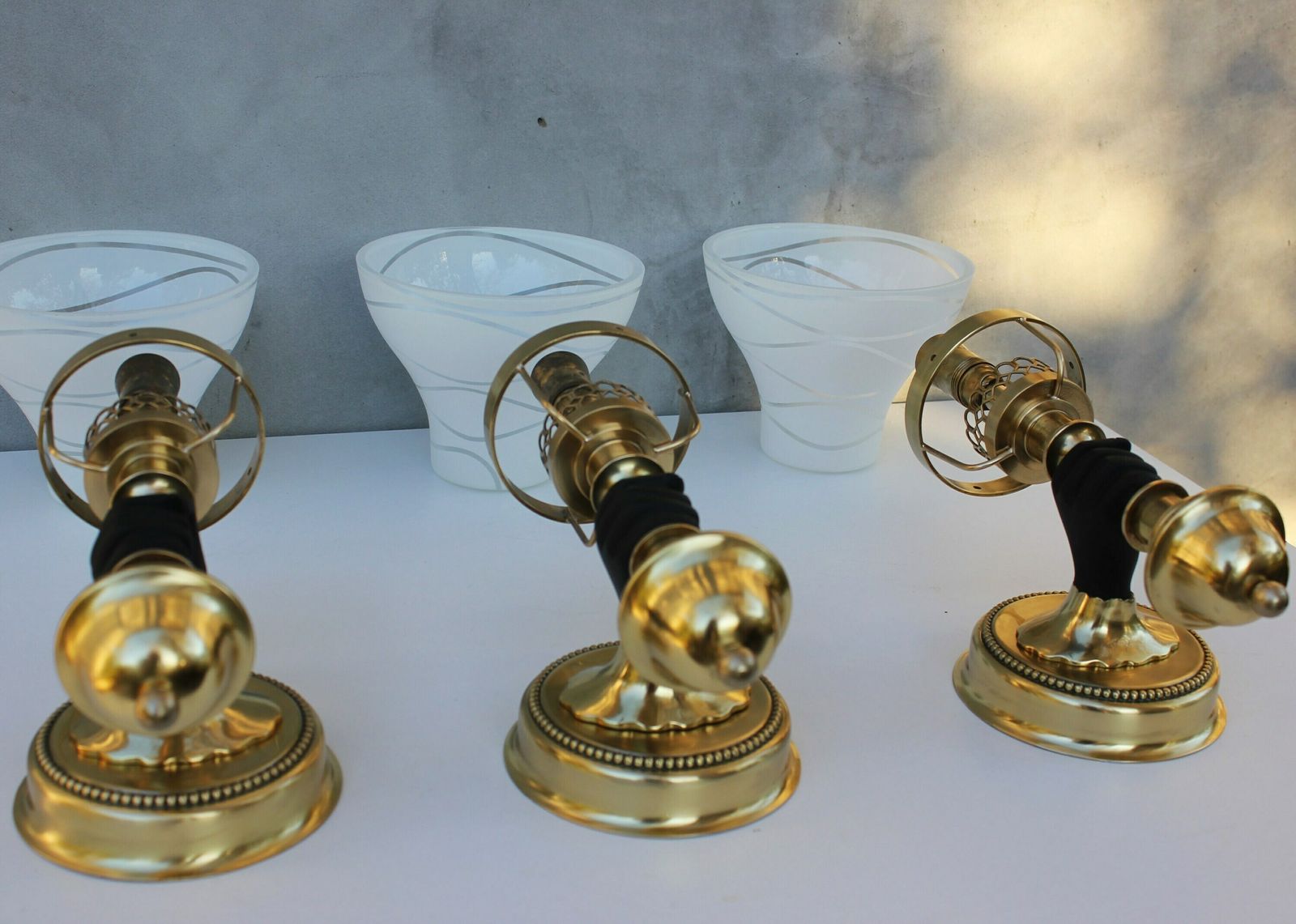 photo for sale Maison Jansen Style Polished Brass Sconces, Rare Set Of Three Wall Lamps, Hollywood Regency Home Design