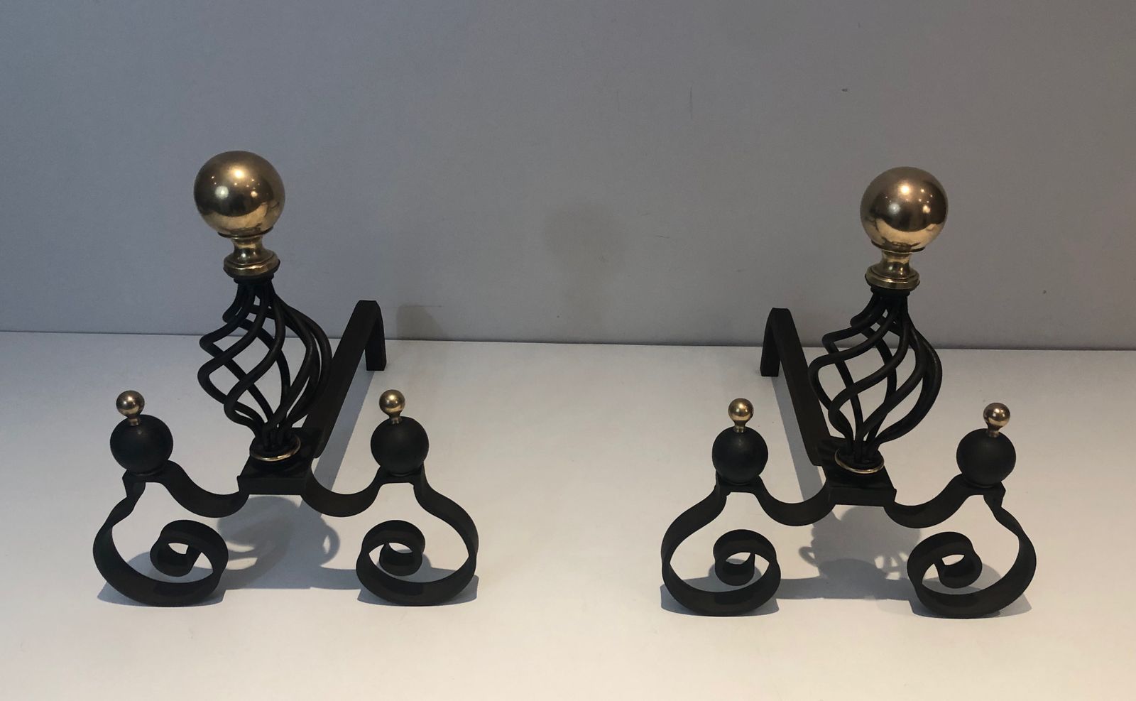 Pair Of Wrought Iron Andirons Topped With A Brass Ball photo furniture