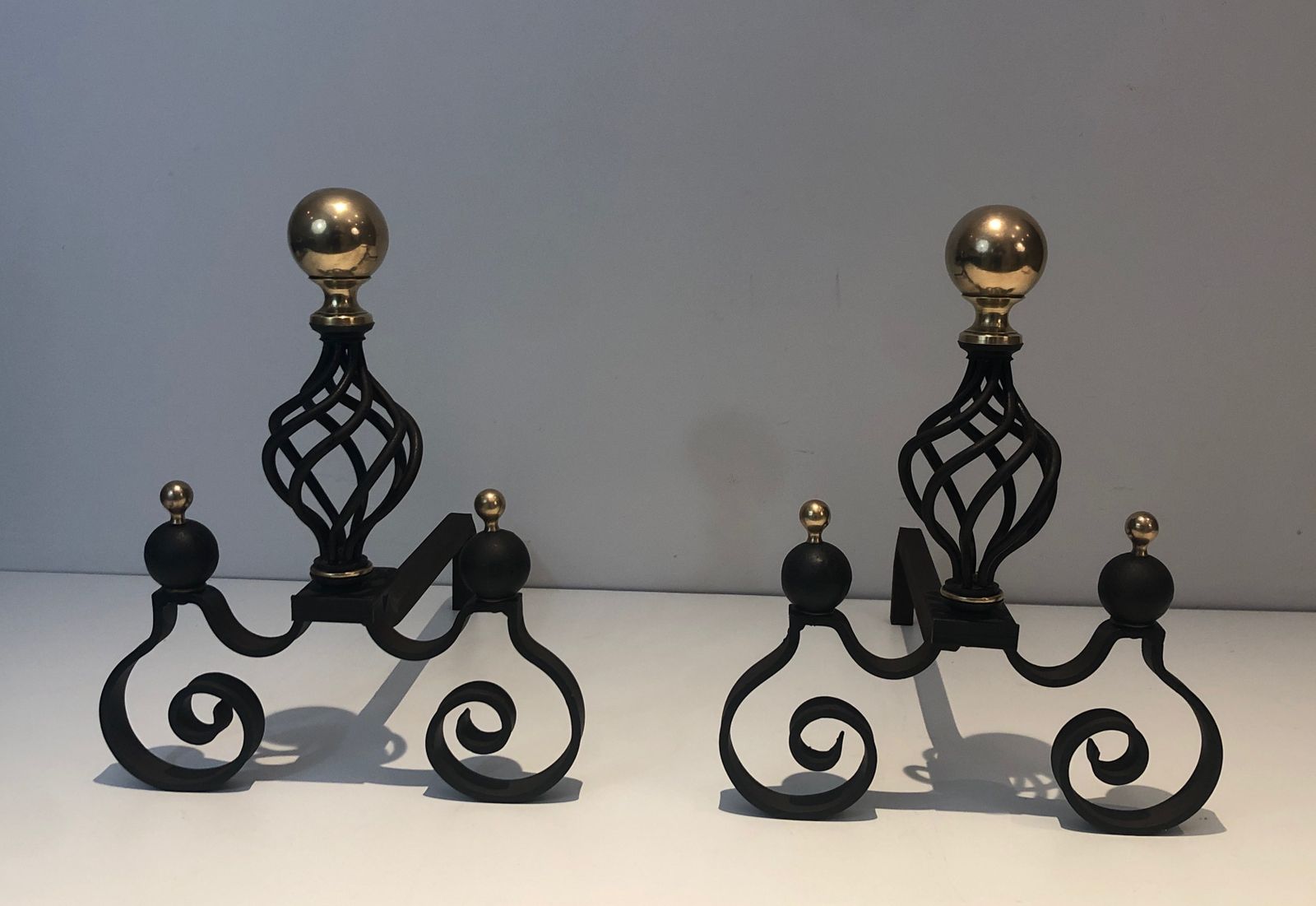 1250.0 Pair Of Wrought Iron Andirons Topped With A Brass Ball photo