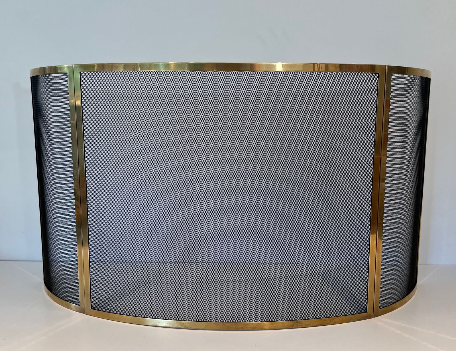 Curved Brass Firewall And Wire Mesh photo Home Fixtures