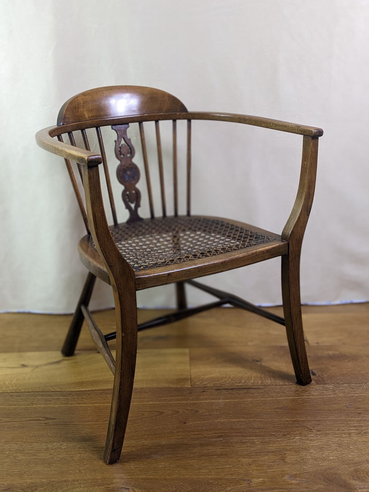 Very Pretty Victorian Rattan Cane Bergere Tub Chair From Late 19th Century With Half Spindle Back And Pierced Central Splat photo furniture