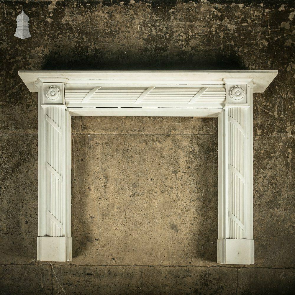 White Marble Fireplace Of Roman Ornate Design