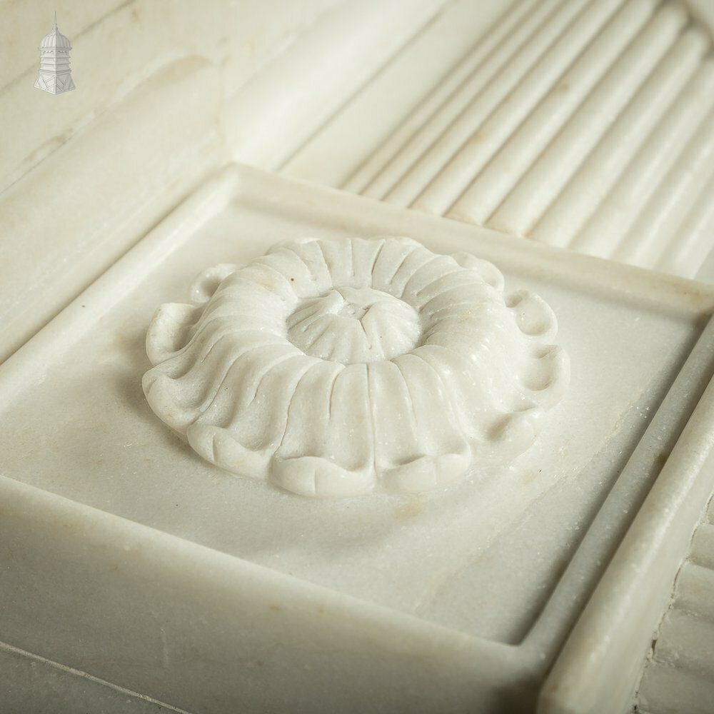 White Marble Fireplace Of Roman Ornate Design photo vinterior
