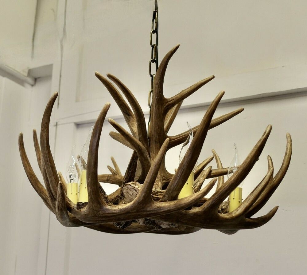 photo furniture Large Simulated Black Forrest Stag Antler Hanging Chandelier