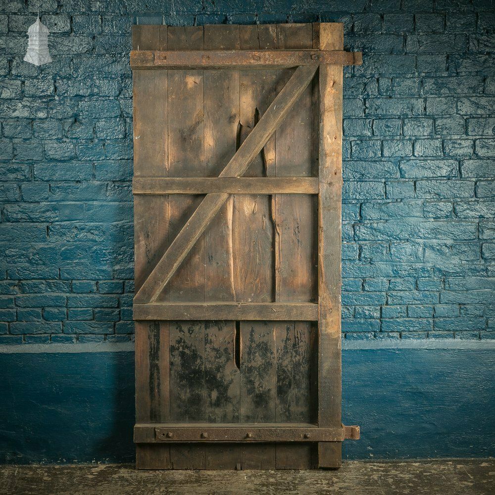 Rustic Pine Ledged And Braced Door With Large Iron Strap Hinges photo furniture