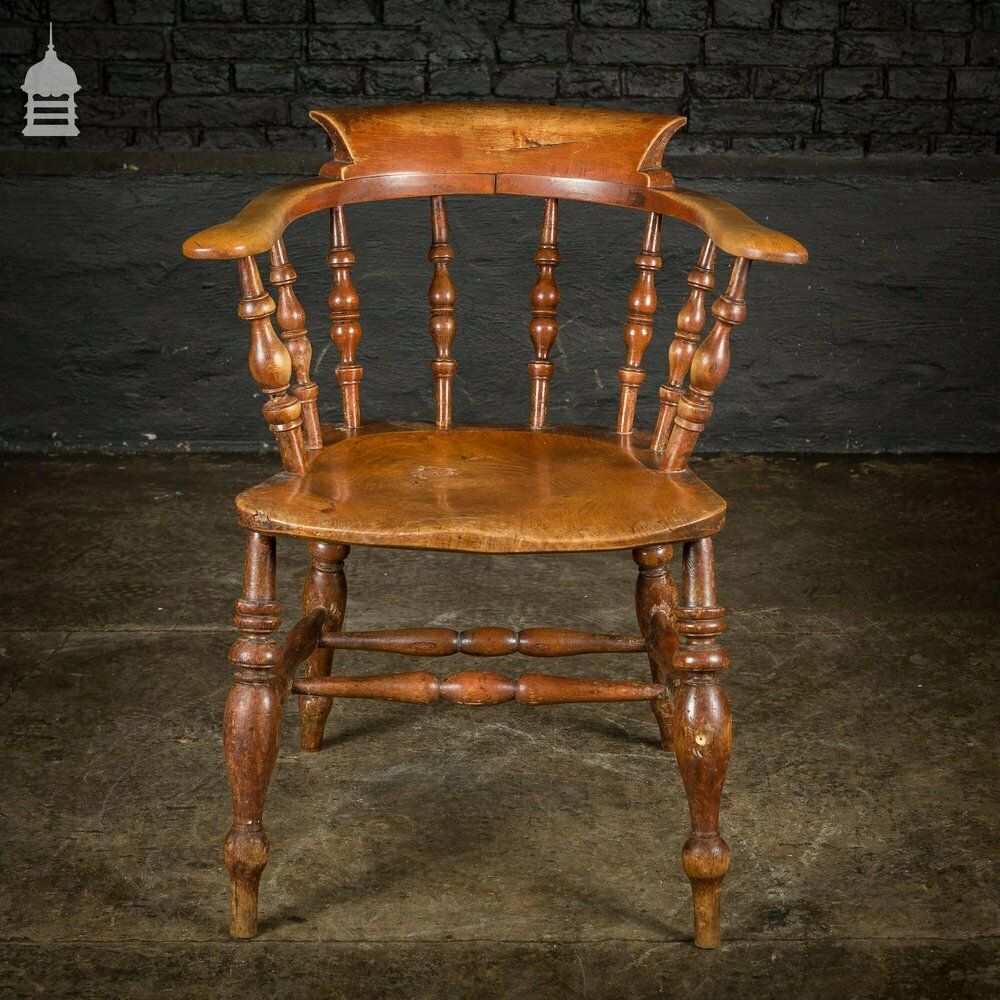19th C Elm Captains Bow Seat Smokers Chair With Turned Arm Support And Double H Stretcher