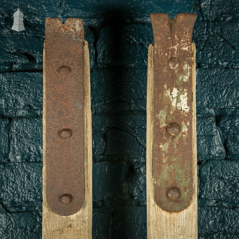 Pair Of Long Hardwood Pry Bars With Metal Ends photo 660.0