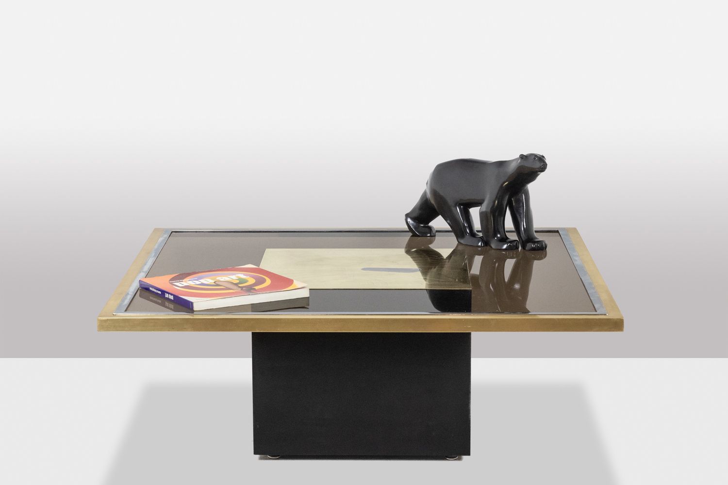 photo for sale Coffee Table In Gilded Brass And Smoked Glass. 1970s.