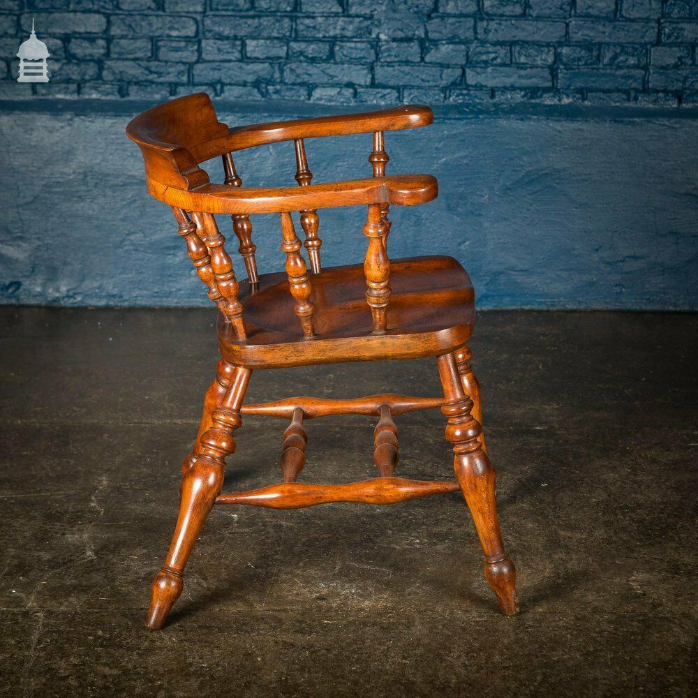 19th C Elm Captain’s Bow Seat Smokers Chair With Turned Arm Supports And Double H Stretcher