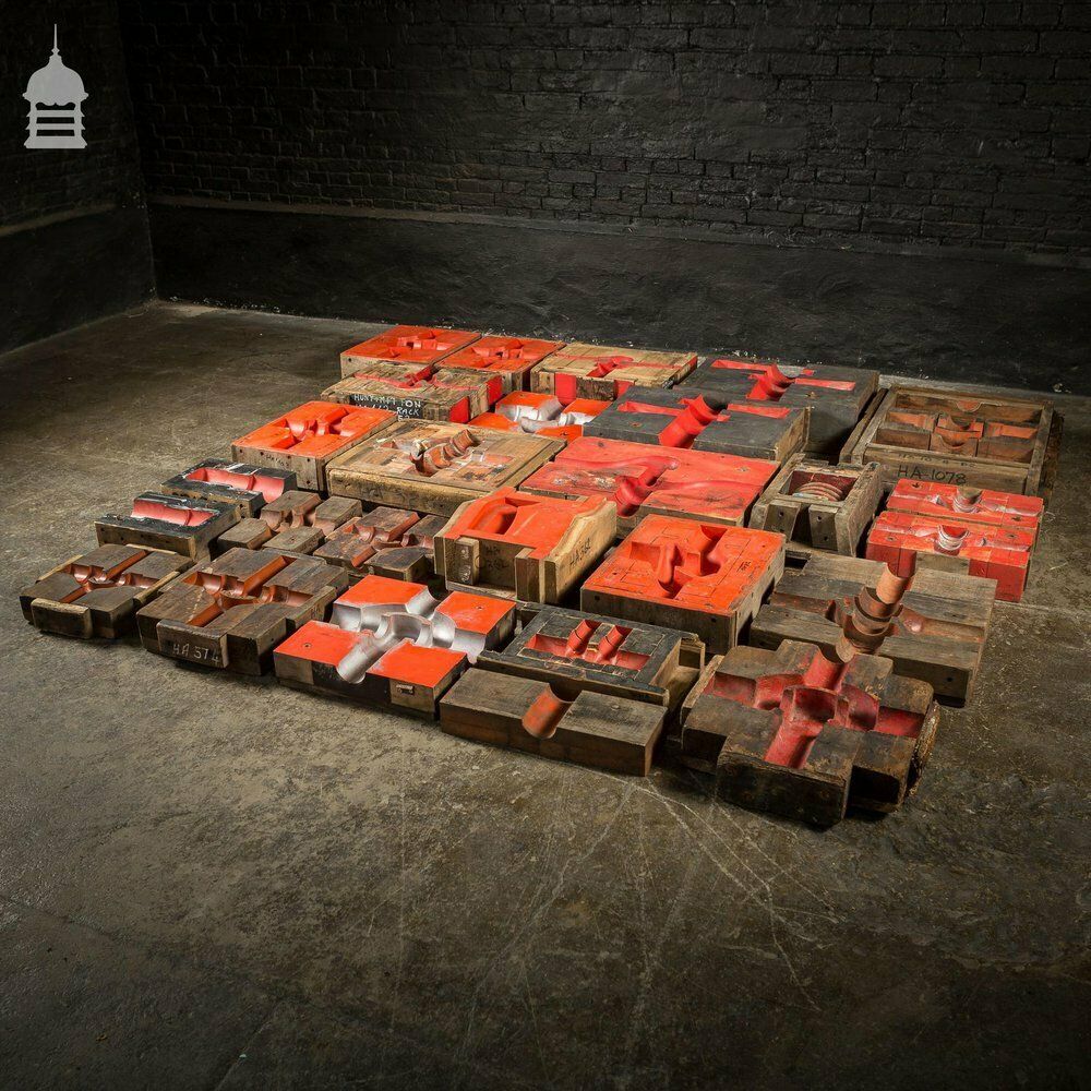 Collection Of 28 Red And Black Industrial Foundry Factory Moulds photo vinterior