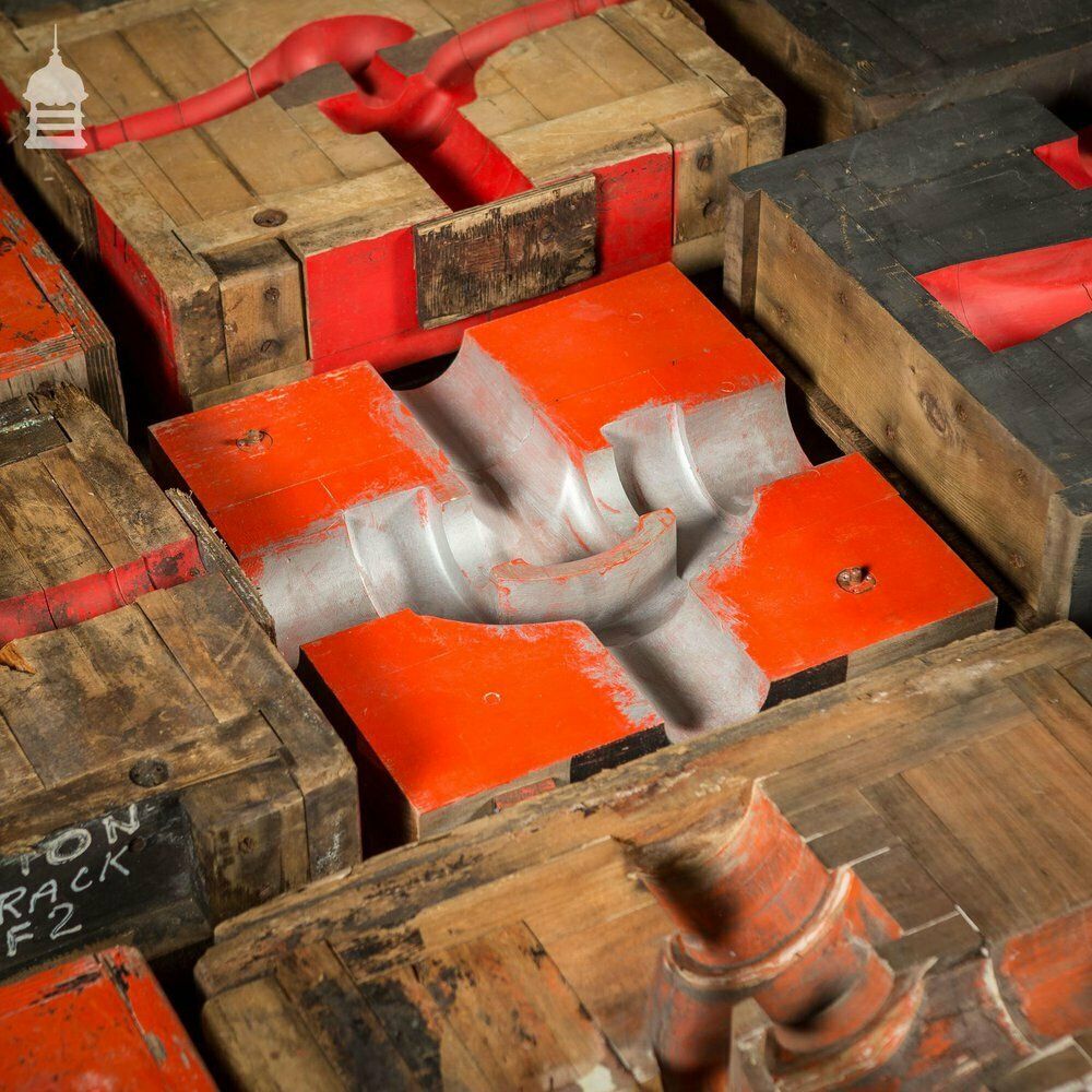 photo for sale Collection Of 28 Red And Black Industrial Foundry Factory Moulds