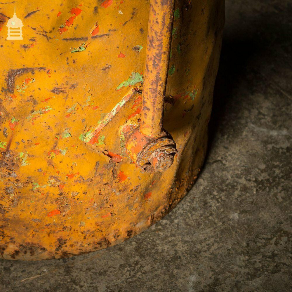 540.0 Large Industrial Yellow Painted Steel Barrel With Swing Handle photo
