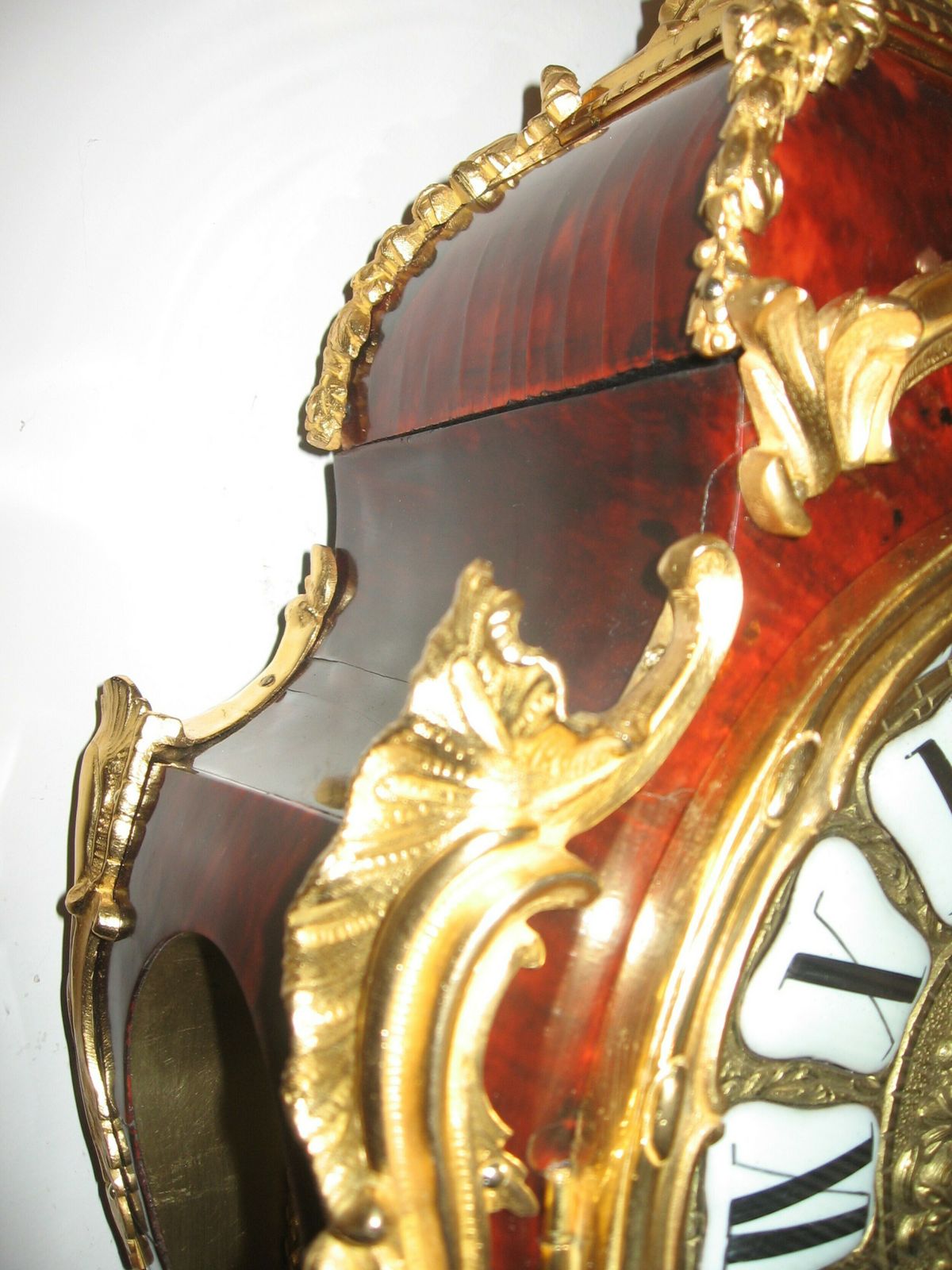 Antique French Ormolu And Faux Tortoiseshell Clock And Bracket photo for sale