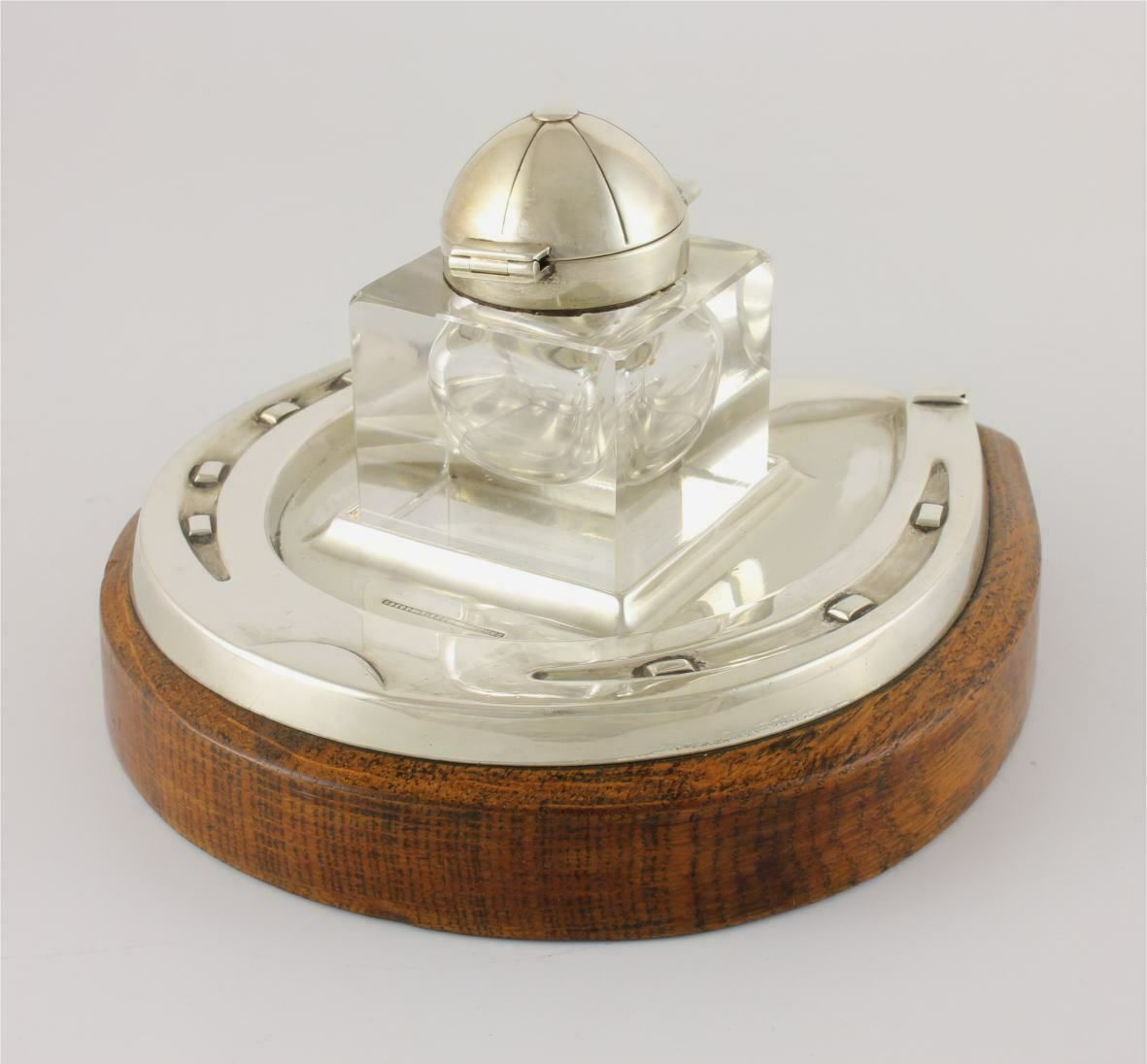 photo furniture Silver Plate & Oak Horseshoe With Jockey Cap Glass Inkwell Desk Stand.