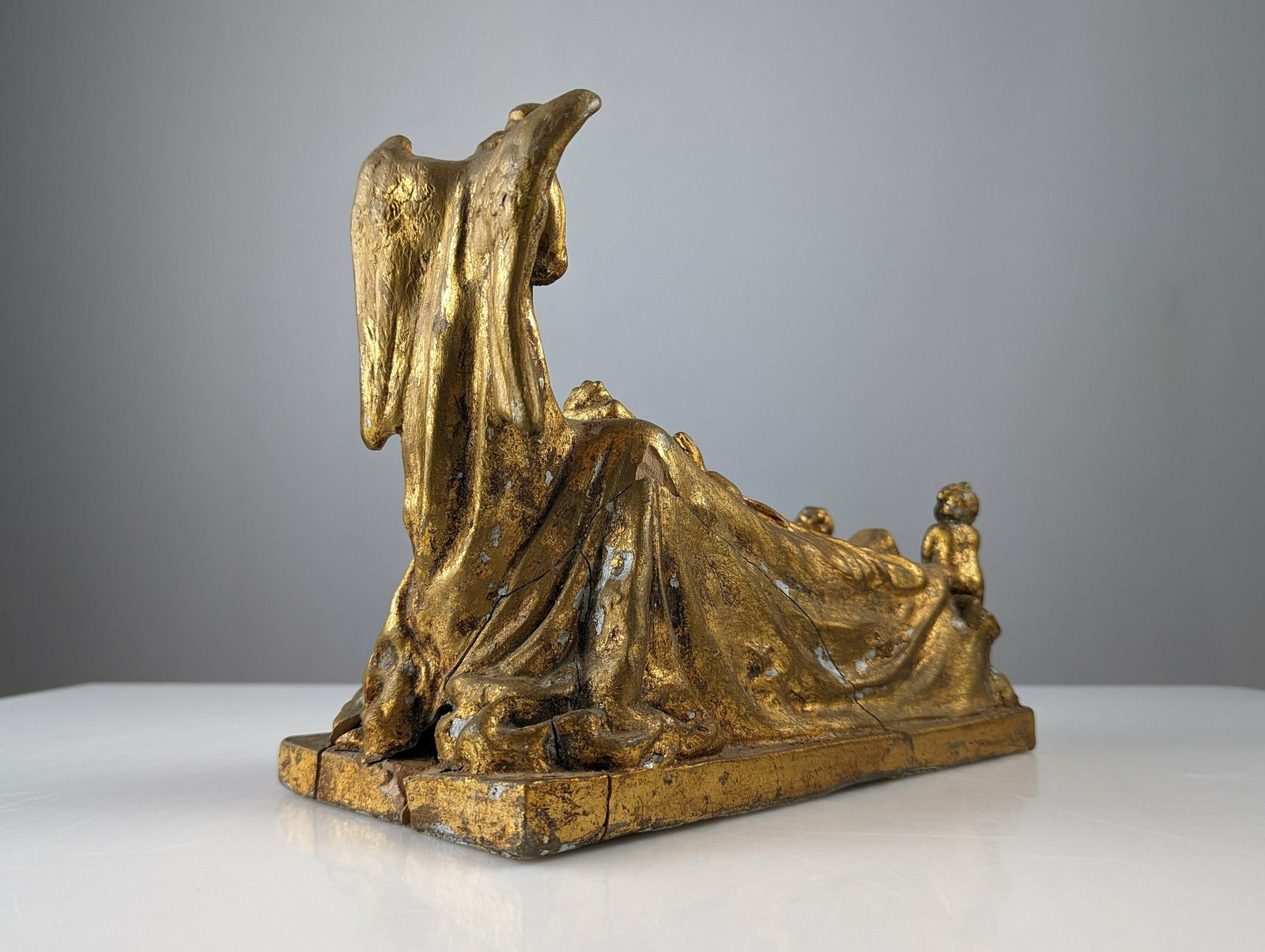Queen And Angels Sculpture In Golden Terracotta photo furniture
